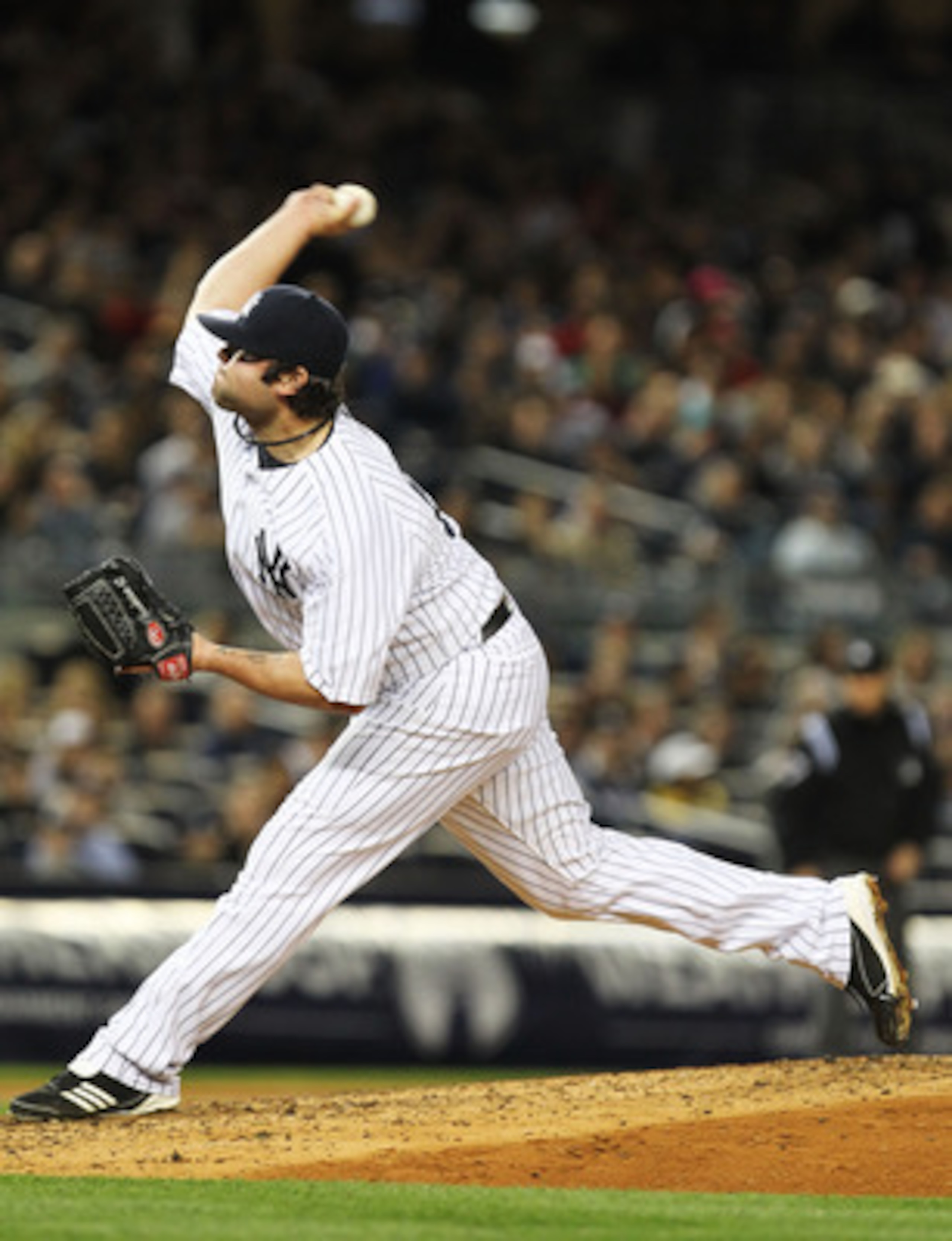 NEW YORK, NY - MAY 13:  Joba Chamberlain #62 of the New York Yankees pitches against the Boston Red Sox  during their game on May 13, 2011 at Yankee Stadium in the Bronx borough of New York City.  (Photo by Al Bello/Getty Images)