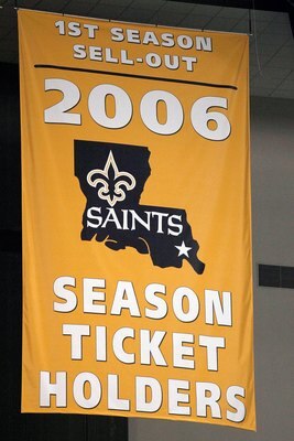 NEW ORLEANS - JANUARY 13:  A banner reading '1st Season Sell-Out 2006 Season Ticket Holders' is unveiled before the NFC divisional playoff game between the Philadelphia Eagles and the New Orleans Saints at the Superdome on January 13, 2007 in New Orleans,