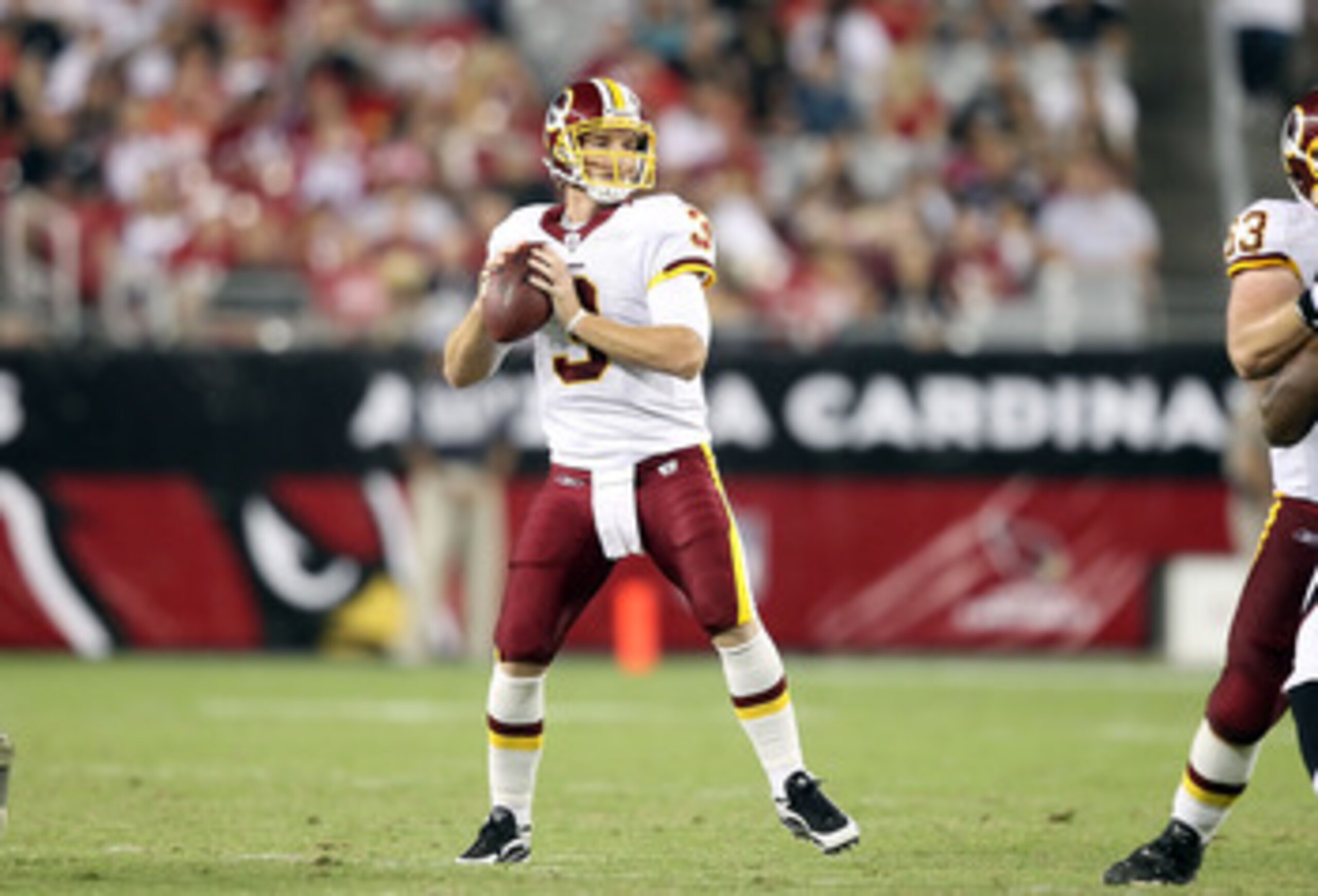 GLENDALE, AZ - SEPTEMBER 02:  Quarterback John Beck #3 of the Washington Redskins drops back to pass during the preseason NFL game against the Arizona Cardinals at the University of Phoenix Stadium on September 2, 2010 in Glendale, Arizona.  The Cardinals