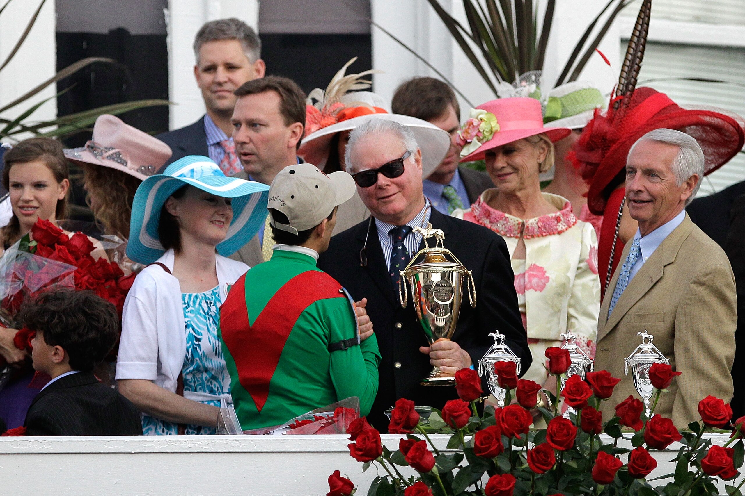 LOUISVILLE, KY - MAY 07:  Barry Irwin, owner of Animal Kingdom congraulates jockey John Velazquez, in the winner's circle after they won the 137th Kentucky Derby at Churchill Downs on May 7, 2011 in Louisville, Kentucky.  (Photo by Rob Carr/Getty Images)