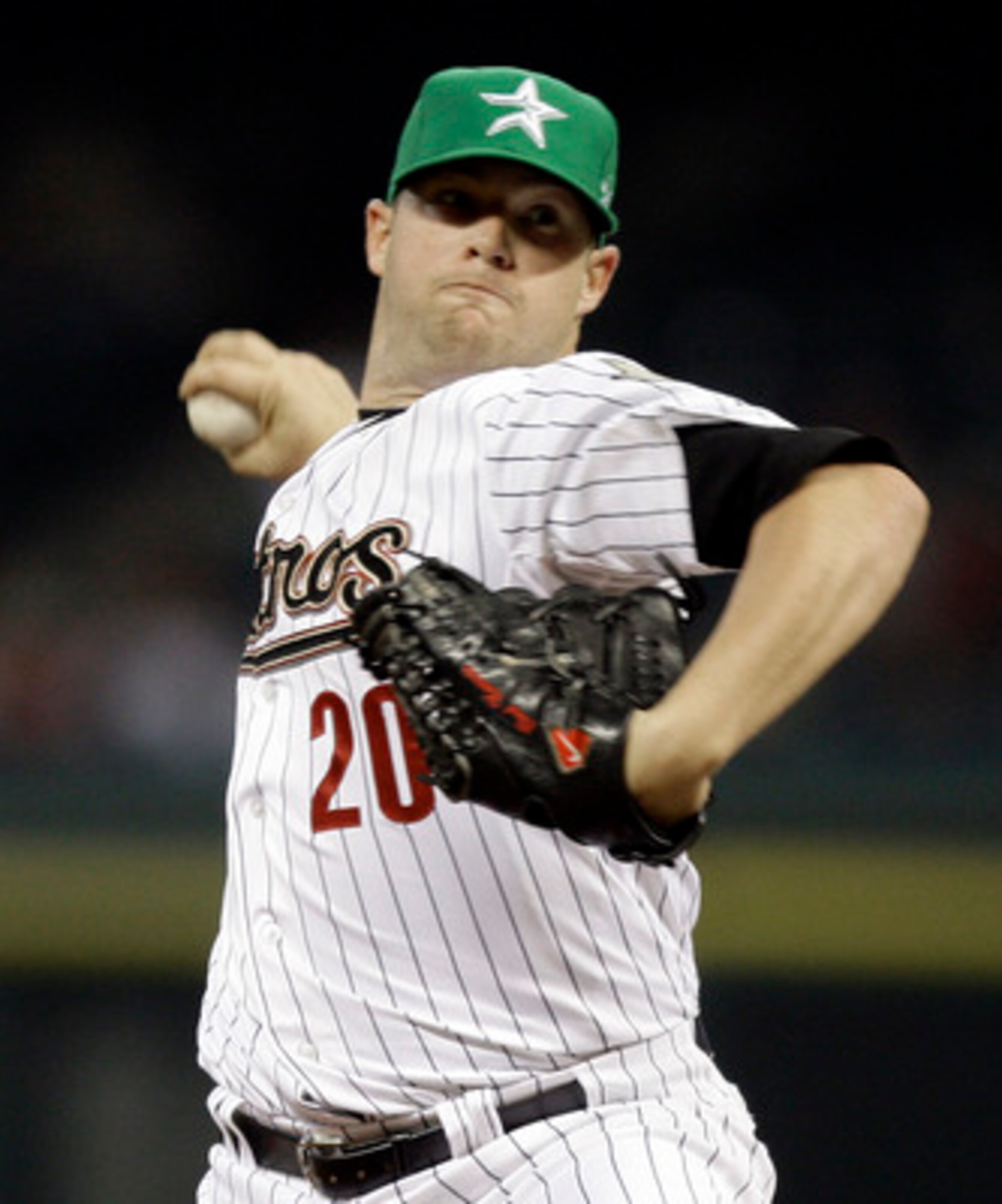 HOUSTON - APRIL 26:  Pitcher Bud Norris #20 of the Houston Astros throws against  the St. Louis Cardinals at Minute Maid Park on April 26, 2011 in Houston, Texas.  (Photo by Bob Levey/Getty Images)