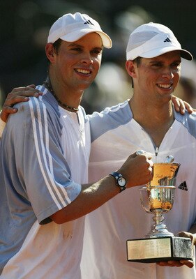 PARIS, FRANCE - JUNE 7:  Bob Bryan and Mike Bryan of the USA with the trophy after winning thier mens doubles final against Paul Haarhuis of the Netherlands and Yevgeny Kafelnikov of Russia during the 13th day of the French Open on June 7, 2003 at Roland 