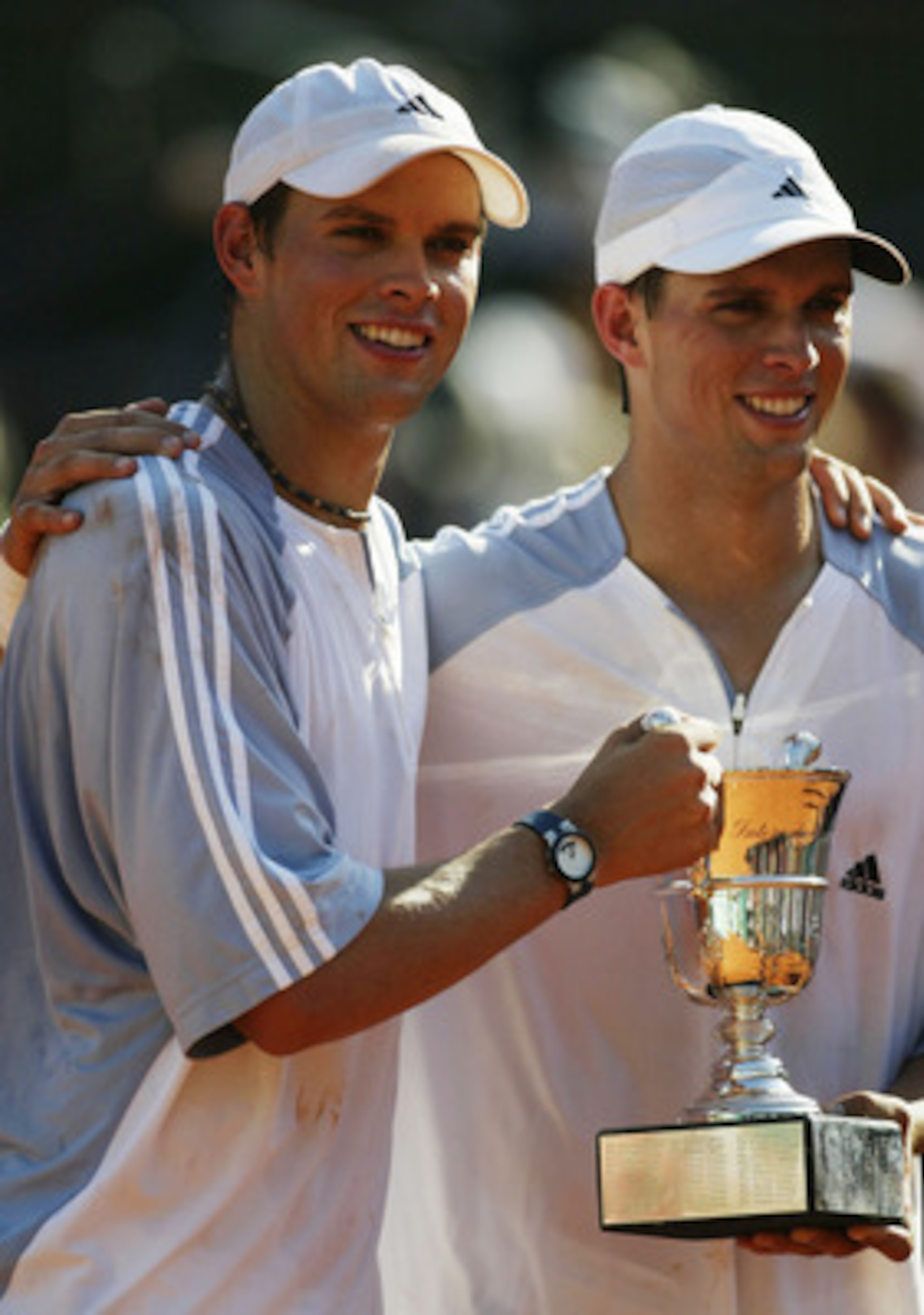PARIS, FRANCE - JUNE 7:  Bob Bryan and Mike Bryan of the USA with the trophy after winning thier mens doubles final against Paul Haarhuis of the Netherlands and Yevgeny Kafelnikov of Russia during the 13th day of the French Open on June 7, 2003 at Roland 