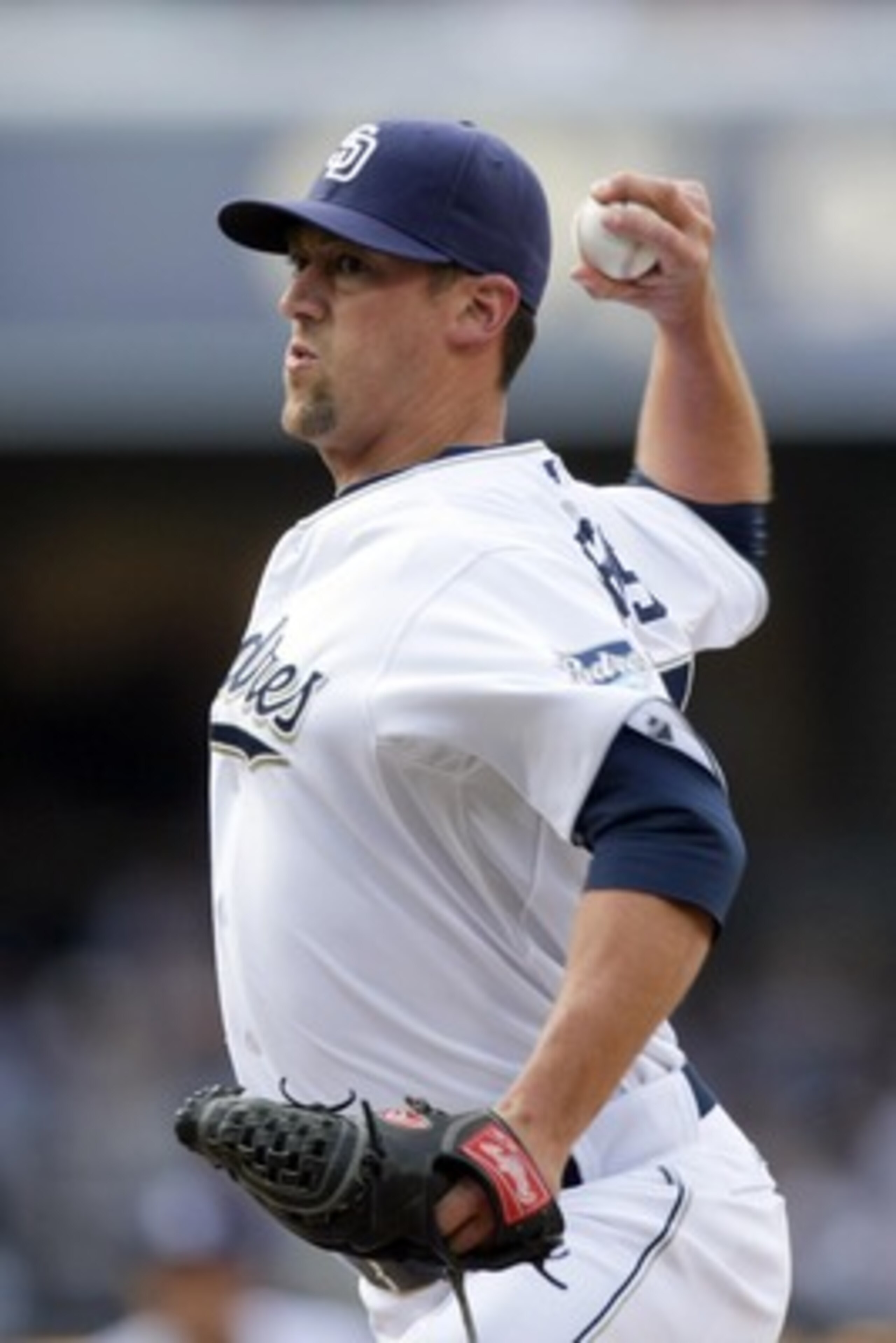 SAN DIEGO, CA - APRIL 5:  Pitcher Luke Gregerson #57 of the San Diego Padres throws the ball against the San Francisco Giants during their MLB Game at Petco Park on April 5, 2011 in San Diego, California. Padres won 3-1. (Photo by Donald Miralle/Getty Ima