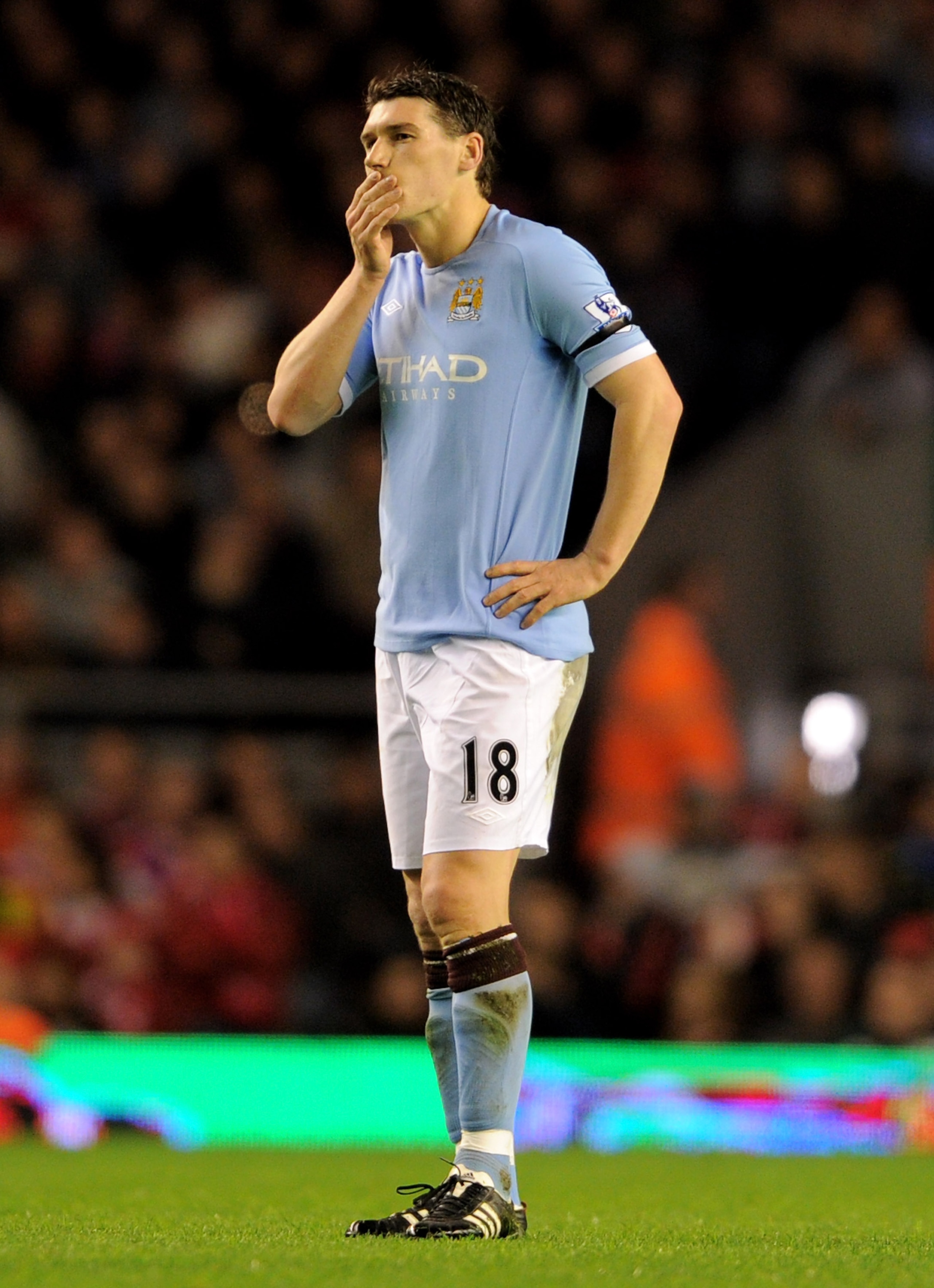 LIVERPOOL, ENGLAND - APRIL 11:  Gareth Barry of Manchester City looks dejected during the Barclays Premier League match between Liverpool and Manchester City at Anfield on April 11, 2011 in Liverpool, England.  (Photo by Michael Regan/Getty Images)