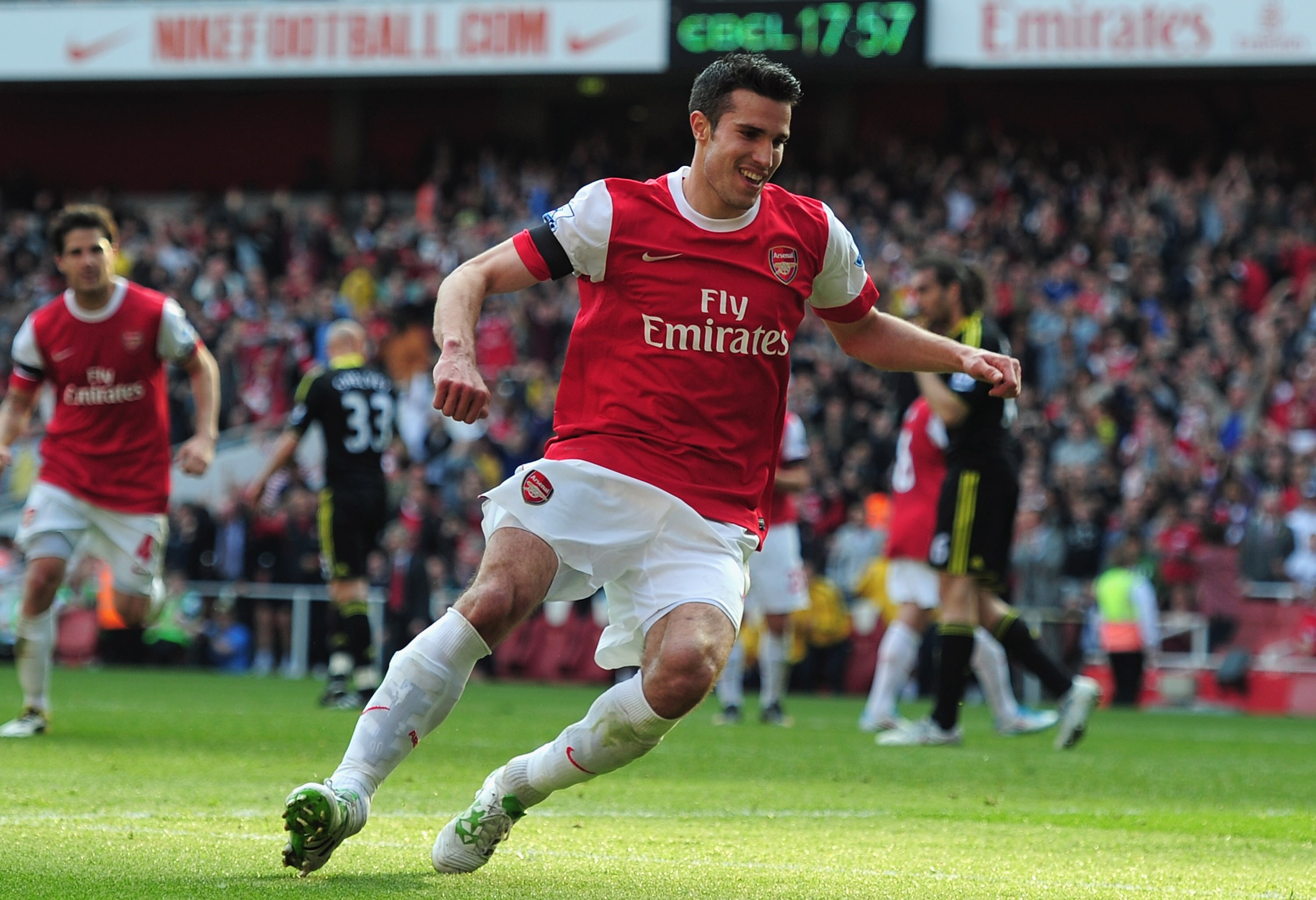 LONDON, ENGLAND - APRIL 17:  Robin van Persie of Arsenal celebrates scoring a penalty kick during the Barclays Premier League match between Arsenal and Liverpool at the Emirates Stadium on April 17, 2011 in London, England.  (Photo by Shaun Botterill/Gett