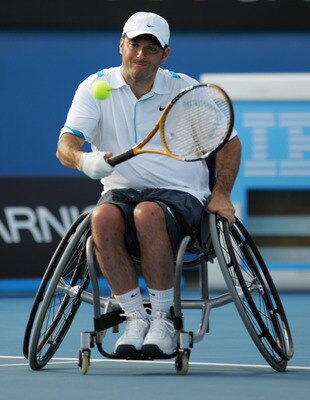 MELBOURNE, AUSTRALIA - JANUARY 31:  David Wagner of the United States of America plays a backhand in his men's quad wheelchair final match against Peter Norfolk of Great Britain during day thirteen of the 2009 Australian Open at Melbourne Park on January