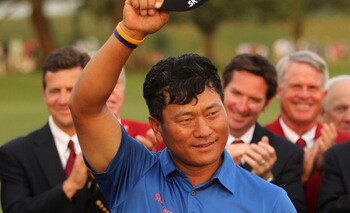 PONTE VEDRA BEACH, FL - MAY 15:  K.J. Choi of South Korea celebrates with the trophy after defeating David Toms on the first playoff hole to win THE PLAYERS Championship held at THE PLAYERS Stadium course at TPC Sawgrass on May 15, 2011 in Ponte Vedra Bea