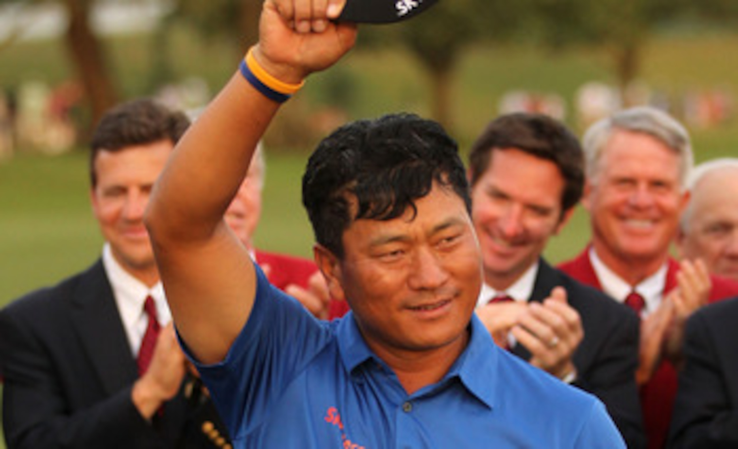 PONTE VEDRA BEACH, FL - MAY 15: K.J. Choi of South Korea celebrates with the trophy after defeating David Toms on the first playoff hole to win THE PLAYERS Championship held at THE PLAYERS Stadium course at TPC Sawgrass on May 15, 2011 in Ponte Vedra Bea PONTE VEDRA BEACH, FL - MAY 15: K.J. Choi of South Korea celebrates with the trophy after defeating David Toms on the first playoff hole to win THE PLAYERS Championship held at THE PLAYERS Stadium course at TPC Sawgrass on May 15, 2011 in Ponte Vedra Bea