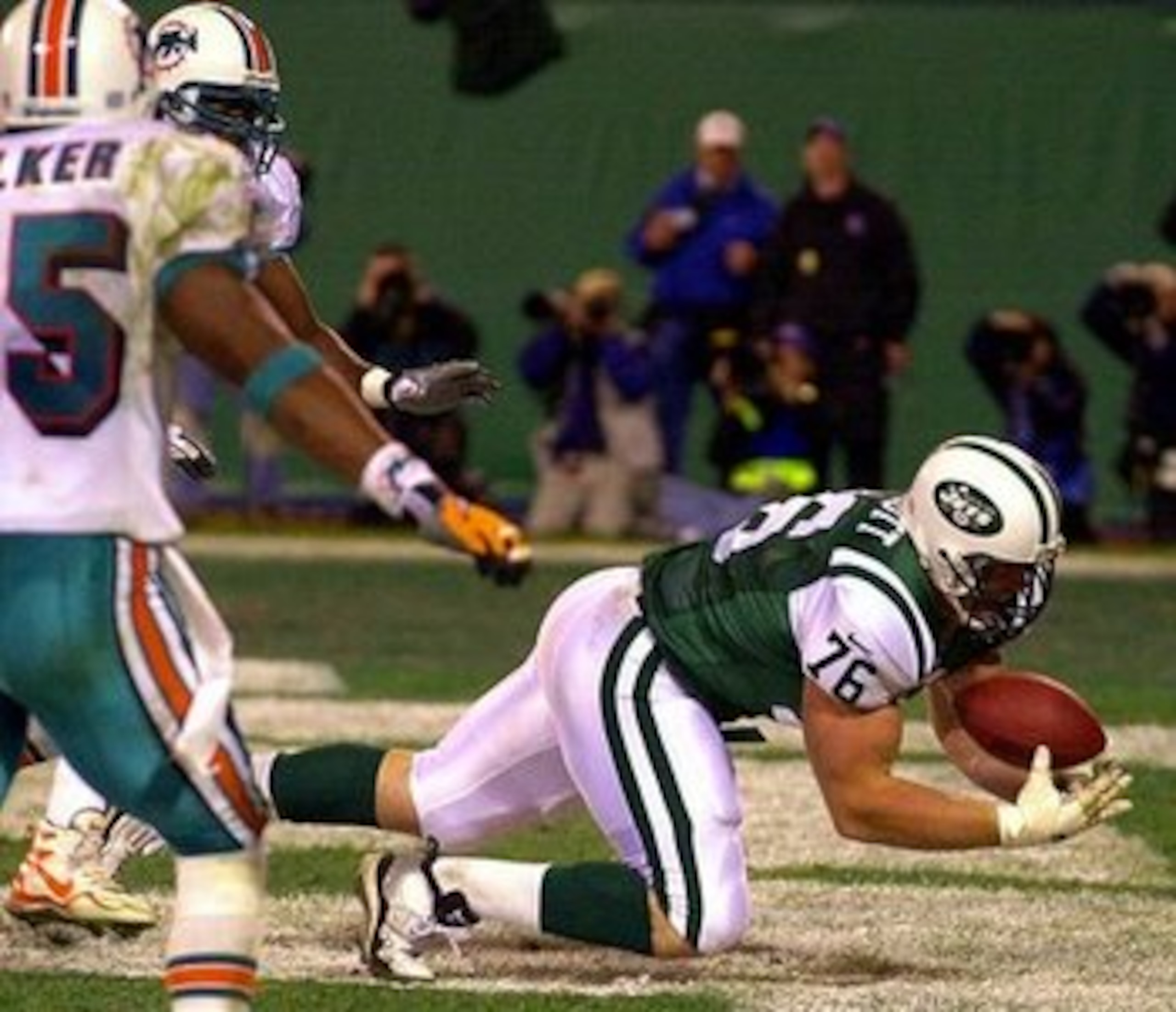 Jets former offensive tackle, Jumbo Elliot catching first touchdown of his career against the Dolphins.