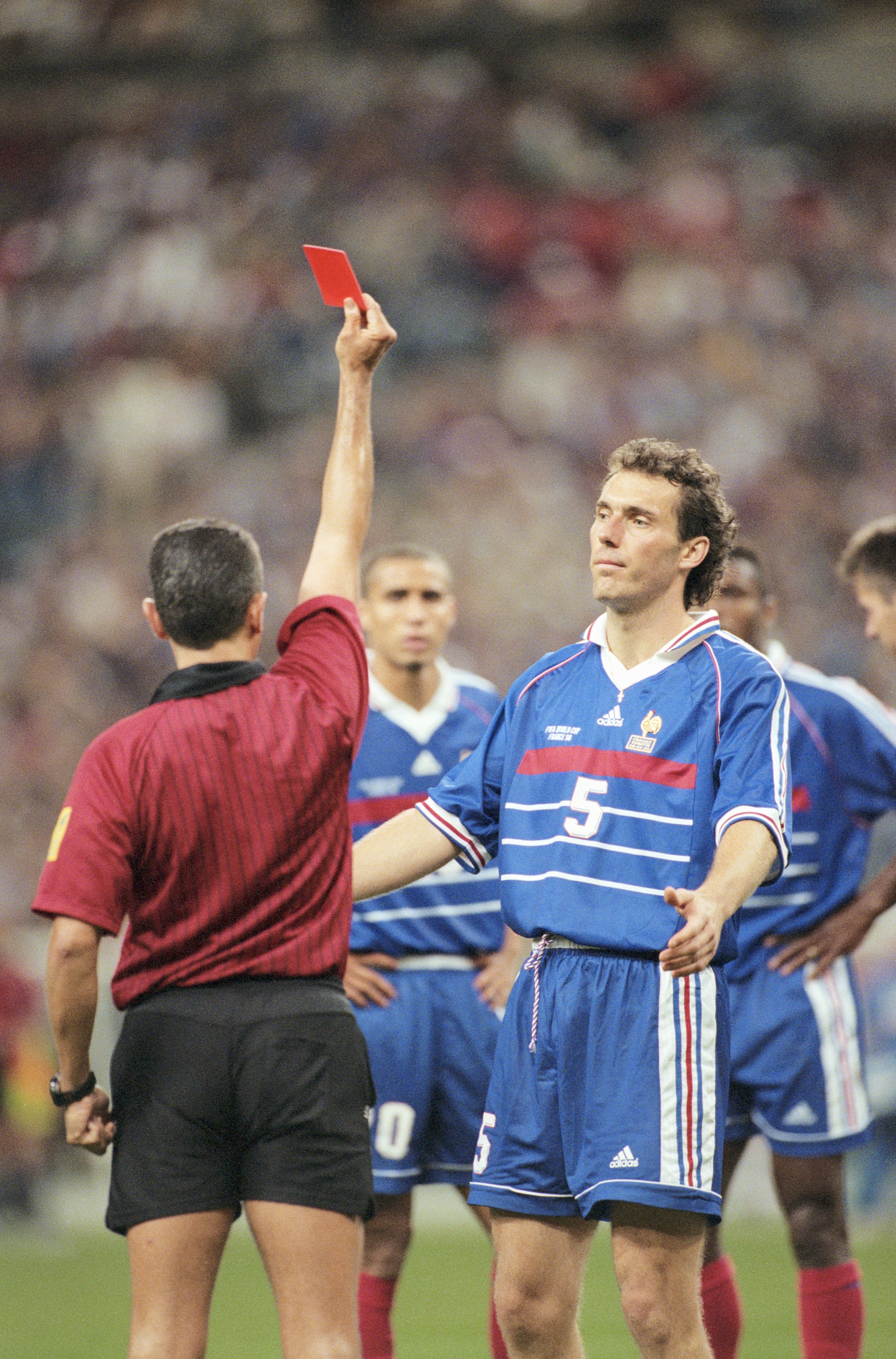 8 Jul 1998:  Referee Jose Garcia-Aranda sends off Laurent Blanc of France for raising a hand at Slaven Bilic of Croatia during the World Cup semi-final at the Stade de France in St Denis. France won 2-1. \ Mandatory Credit: Clive Brunskill /Allsport