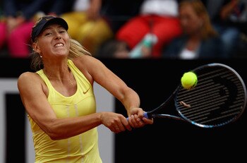 ROME, ITALY - MAY 15:  Maria Sharapova of Russia plays a backhand during the final against Samantha Stosur of Australia during day eight of the Internazoinali BNL D'Italia at the Foro Italico Tennis Centre on May 15, 2011 in Rome, Italy.  (Photo by Clive 