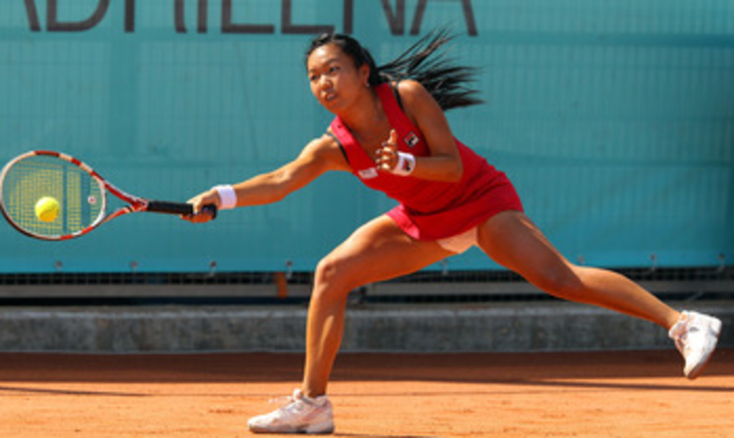MADRID, SPAIN - MAY 03:  Vania King of USA stretches for a forehand in her match against Bethanie Mattek-Sands of USA during day four of the Mutua Madrilena Madrid Open Tennis on May 3, 2011 in Madrid, Spain.  (Photo by Julian Finney/Getty Images)