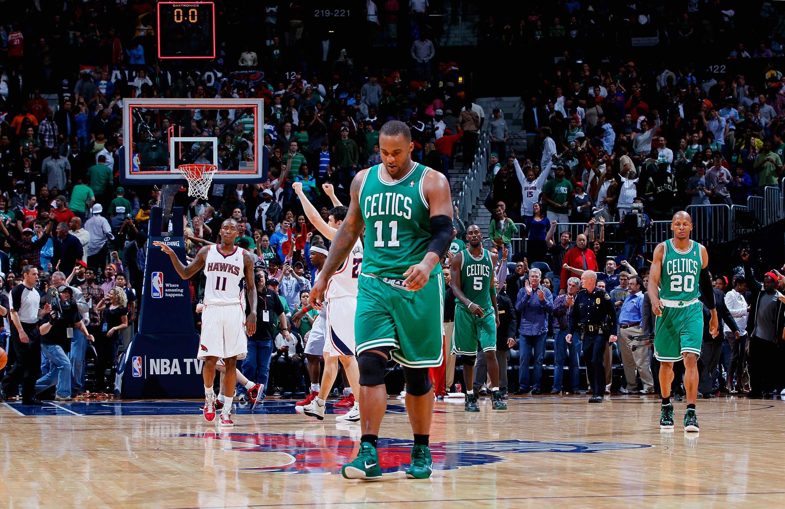 ATLANTA, GA - APRIL 01: Glen Davis #11 of the Boston Celtics walks off the court at the end of the third period against the Atlanta Hawks at Philips Arena on April 1, 2011 in Atlanta, Georgia. NOTE TO USER: User expressly acknowledges and agrees that, b ATLANTA, GA - APRIL 01: Glen Davis #11 of the Boston Celtics walks off the court at the end of the third period against the Atlanta Hawks at Philips Arena on April 1, 2011 in Atlanta, Georgia. NOTE TO USER: User expressly acknowledges and agrees that, b