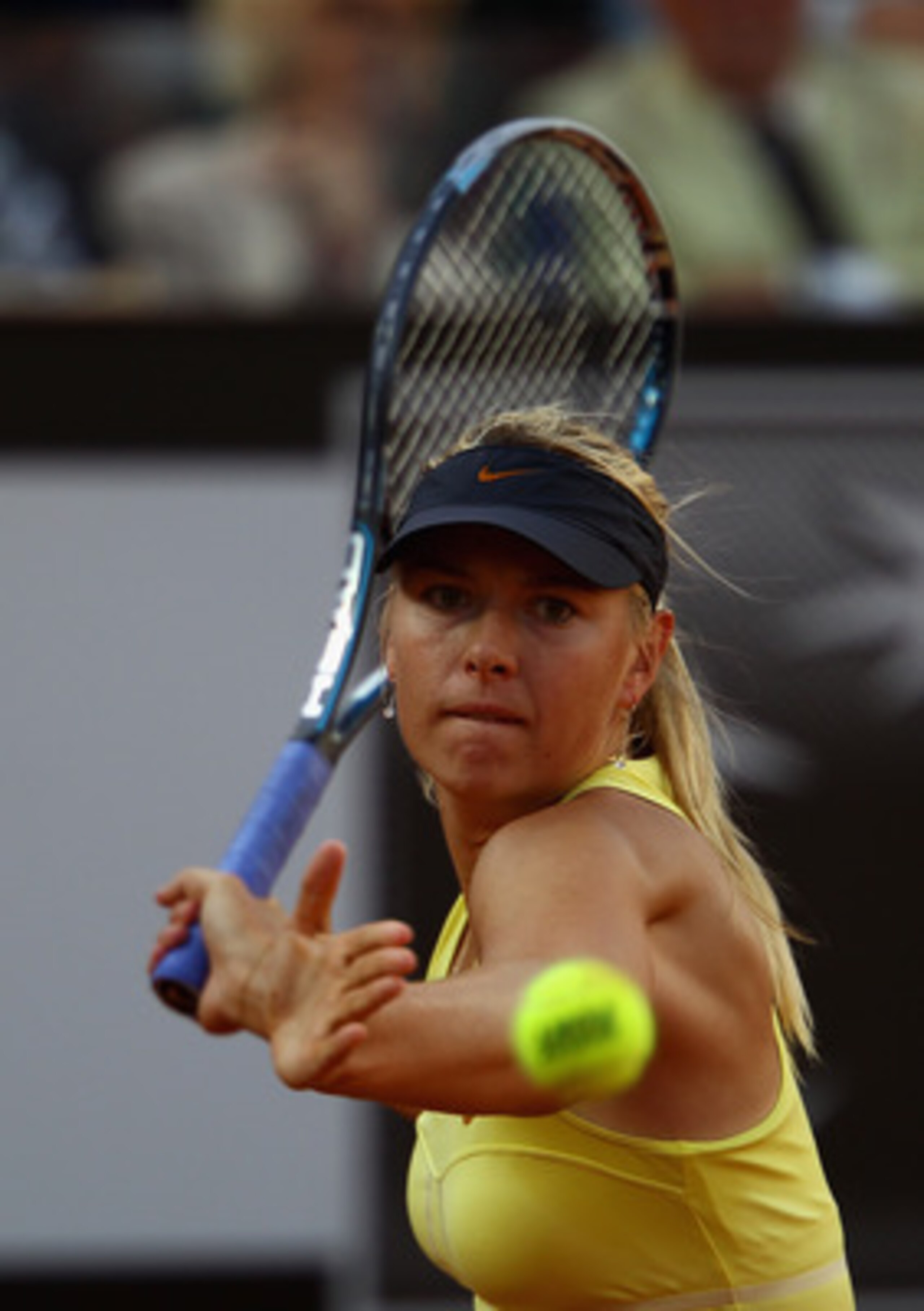 ROME, ITALY - MAY 15:  Maria Sharapova of Russia lines up to play a forehand during the final against Samantha Stosur of Australia during day eight of the Internazoinali BNL D'Italia at the Foro Italico Tennis Centre on May 15, 2011 in Rome, Italy.  (Phot