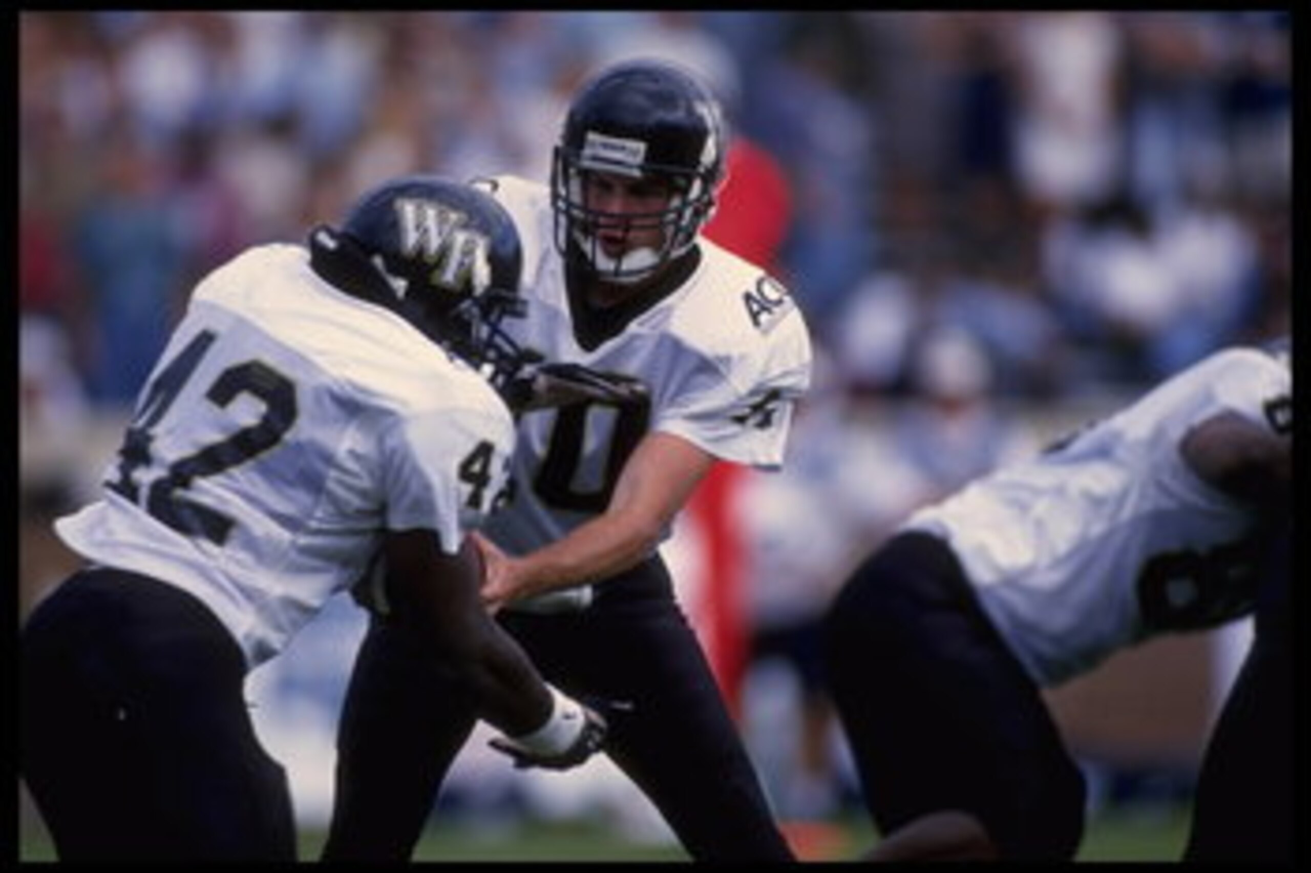 30 Sep 1995:  Quarterback Rusty LaRue of Wake Forest hands the football off during a 35-17 loss to the University of Virginia at Scott Stadium in Virginia.  Mandatory Credit:  Doug Pensinger/Allsport
