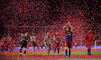 BARCELONA, SPAIN - MAY 15:  Youth players of Barcelona and Espanyo play, besides the newly build dormitories for the Barcelona youth players, on one of the pitches at the Joan Camper training ground on May 15, 2011 in Barcelona, Spain. Every weekend vario