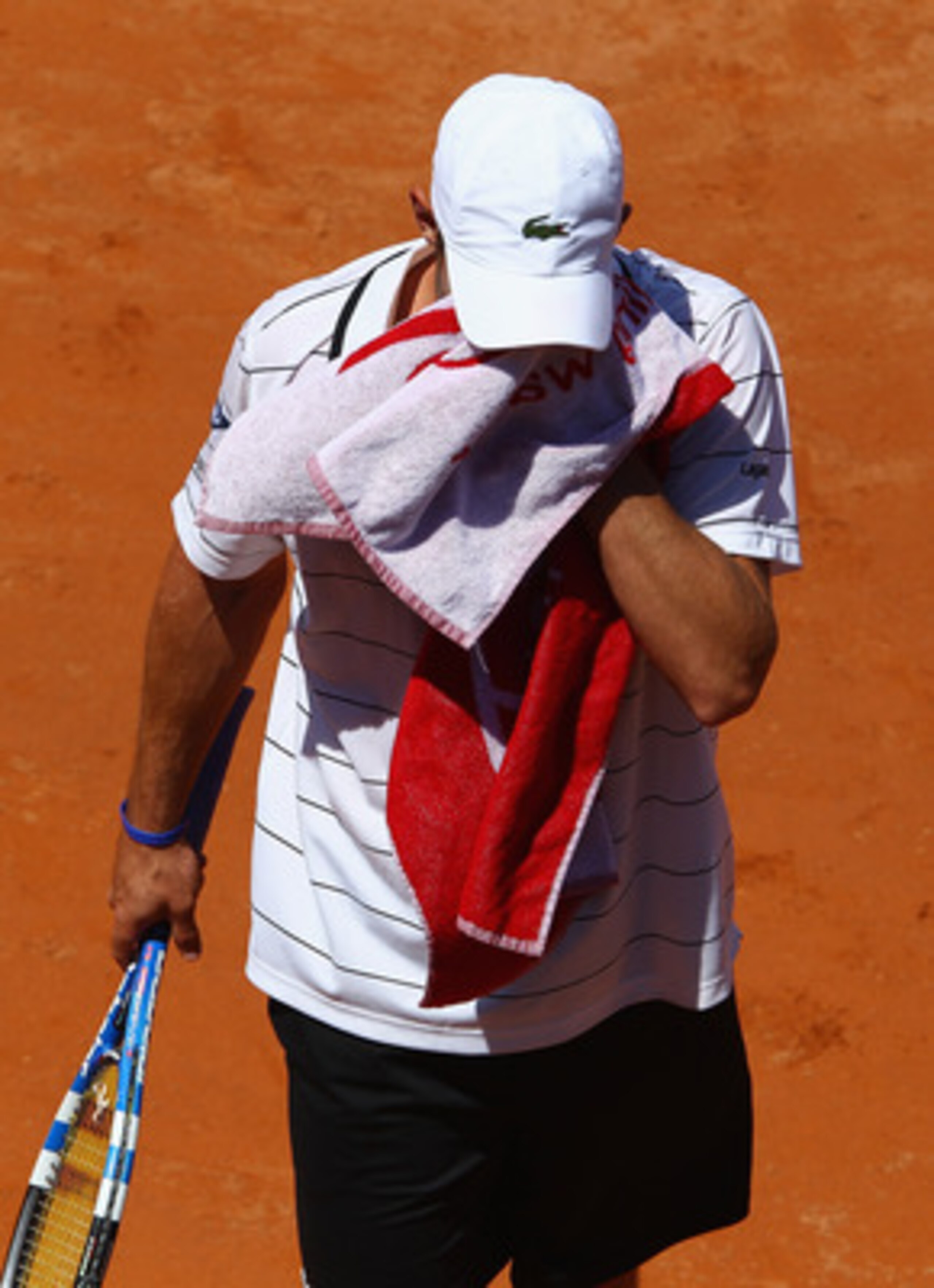 ROME, ITALY - MAY 09: Andy Roddick of the USA shows his dejection as he loses in straight sets during his first round match against Gilles Simon of France during day two of the Internazoinali BNL D'Italia at the Foro Italico Tennis Centre on May 9, 2011 ROME, ITALY - MAY 09: Andy Roddick of the USA shows his dejection as he loses in straight sets during his first round match against Gilles Simon of France during day two of the Internazoinali BNL D'Italia at the Foro Italico Tennis Centre on May 9, 2011
