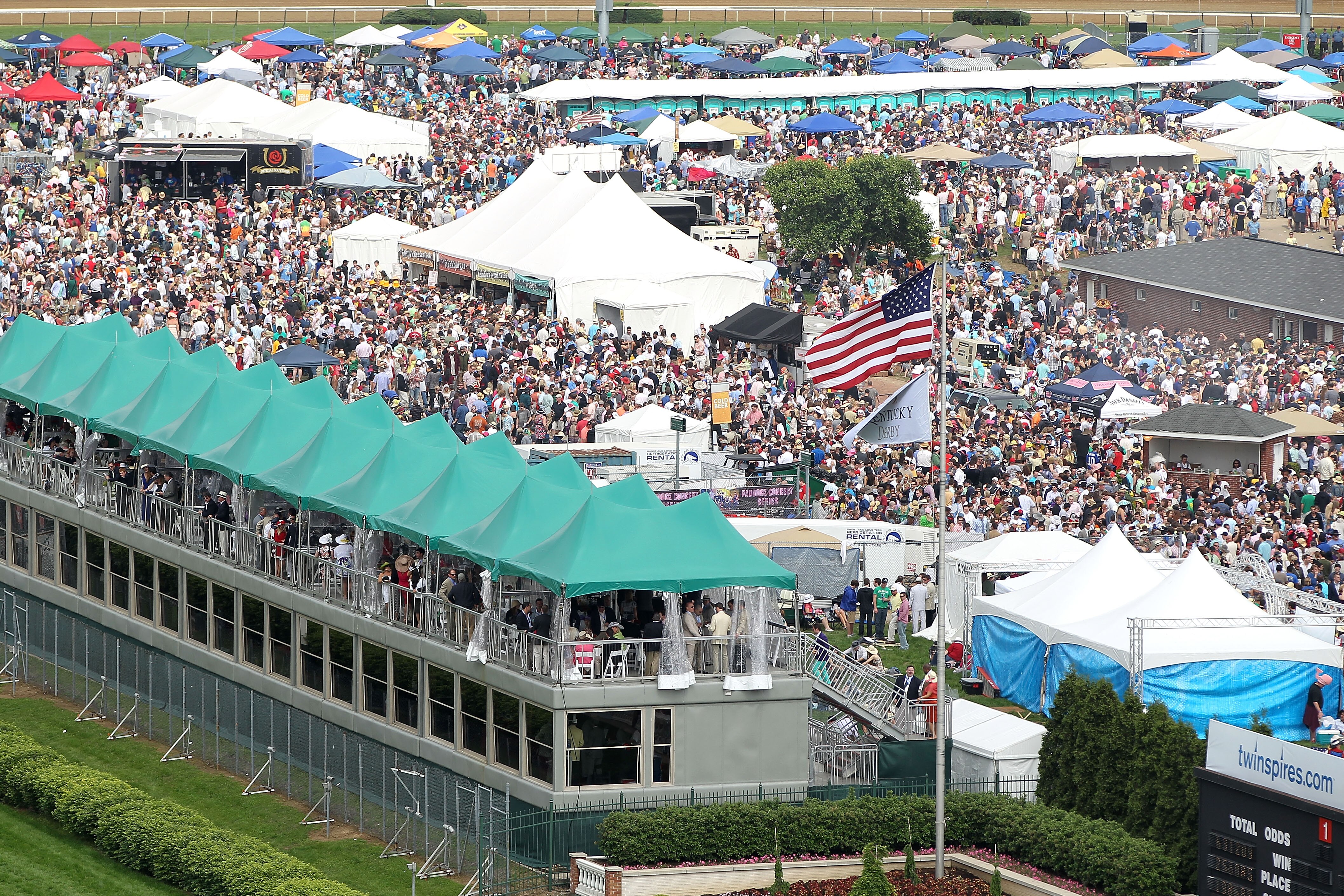 LOUISVILLE, KY - MAY 07:  Fans gather and party in the infield during the 137th Kentucky Derby at Churchill Downs on May 7, 2011 in Louisville, Kentucky.  (Photo by Jamie Squire/Getty Images)