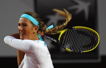 ROME, ITALY - MAY 13:  Victoria Azarenka of Belarus  playsin action during her quarter final match against Maria Sharapova of Russia during day six of the Internazoinali BNL D'Italia at the Foro Italico Tennis Centre  on May 13, 2011 in Rome, Italy.  (Pho