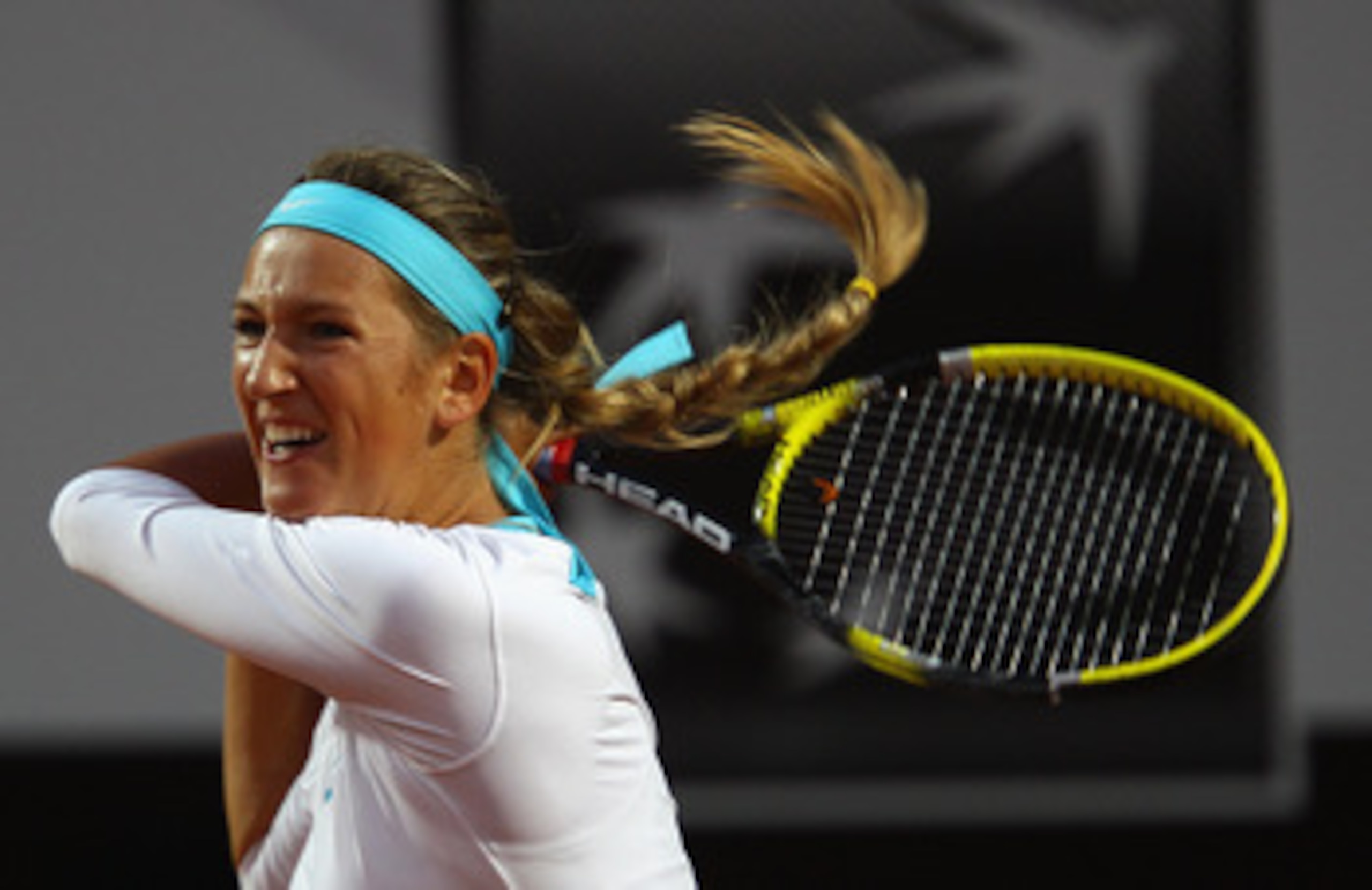 ROME, ITALY - MAY 13: Victoria Azarenka of Belarus playsin action during her quarter final match against Maria Sharapova of Russia during day six of the Internazoinali BNL D'Italia at the Foro Italico Tennis Centre on May 13, 2011 in Rome, Italy. (Pho ROME, ITALY - MAY 13: Victoria Azarenka of Belarus playsin action during her quarter final match against Maria Sharapova of Russia during day six of the Internazoinali BNL D'Italia at the Foro Italico Tennis Centre on May 13, 2011 in Rome, Italy. (Pho