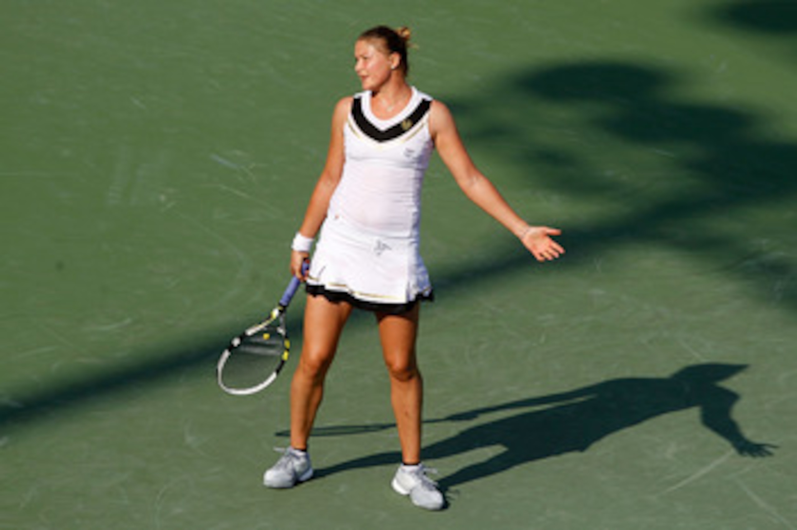 KEY BISCAYNE, FL - MARCH 25: Dinara Safina of Russia reacts against Vera Zvonareva of Russia during the Sony Ericsson Open at Crandon Park Tennis Center on March 25, 2011 in Key Biscayne, Florida. (Photo by Matthew Stockman/Getty Images) KEY BISCAYNE, FL - MARCH 25: Dinara Safina of Russia reacts against Vera Zvonareva of Russia during the Sony Ericsson Open at Crandon Park Tennis Center on March 25, 2011 in Key Biscayne, Florida. (Photo by Matthew Stockman/Getty Images)