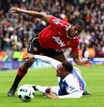 BLACKBURN, ENGLAND - MAY 14:  Jermaine Jones of Blackburn battles for the ball with Antonio Valencia of Manchester United during the Barclays Premier League match between Blackburn Rovers and Manchester United at Ewood park on May 14, 2011 in Blackburn, E