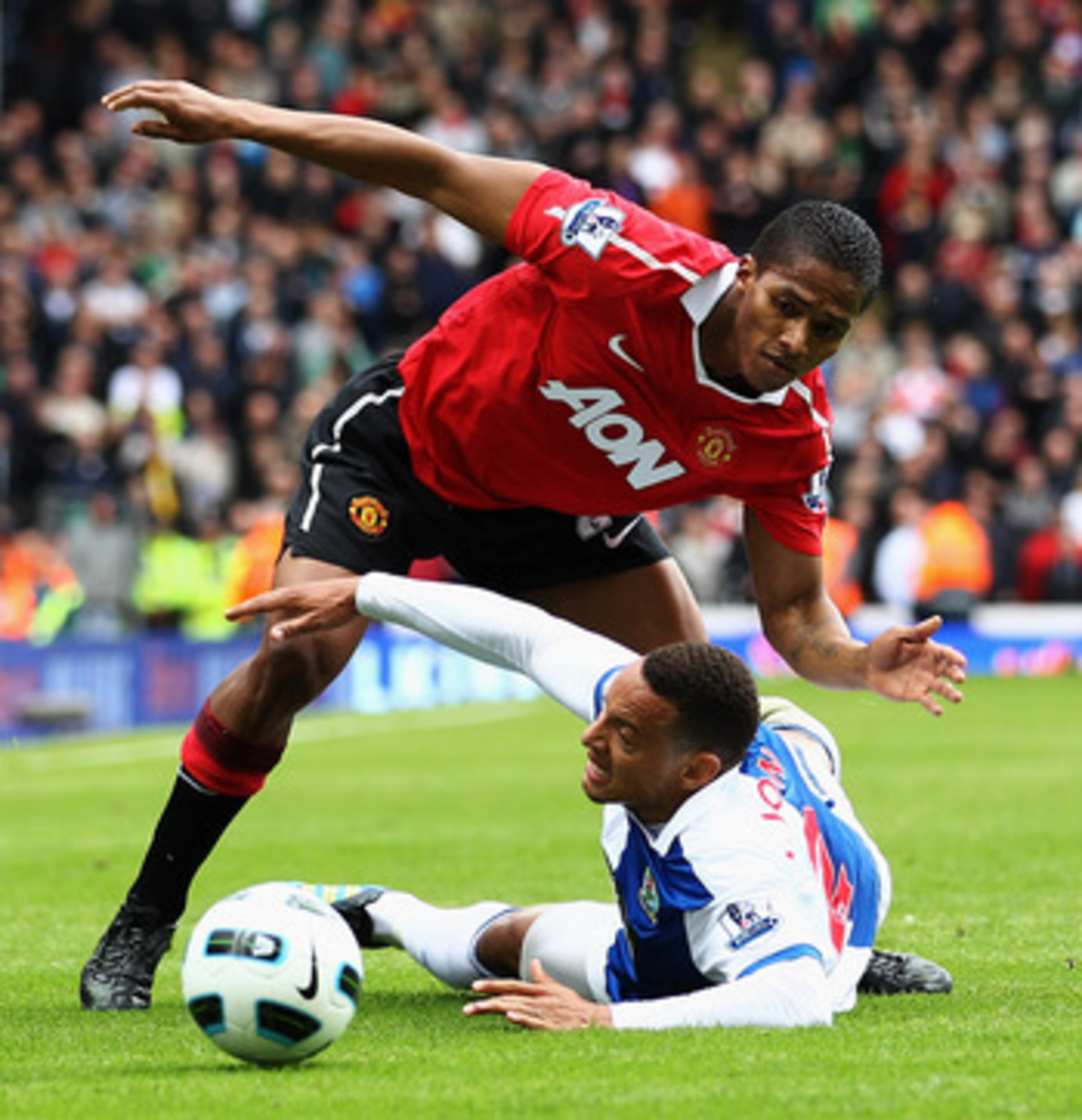 BLACKBURN, ENGLAND - MAY 14:  Jermaine Jones of Blackburn battles for the ball with Antonio Valencia of Manchester United during the Barclays Premier League match between Blackburn Rovers and Manchester United at Ewood park on May 14, 2011 in Blackburn, E