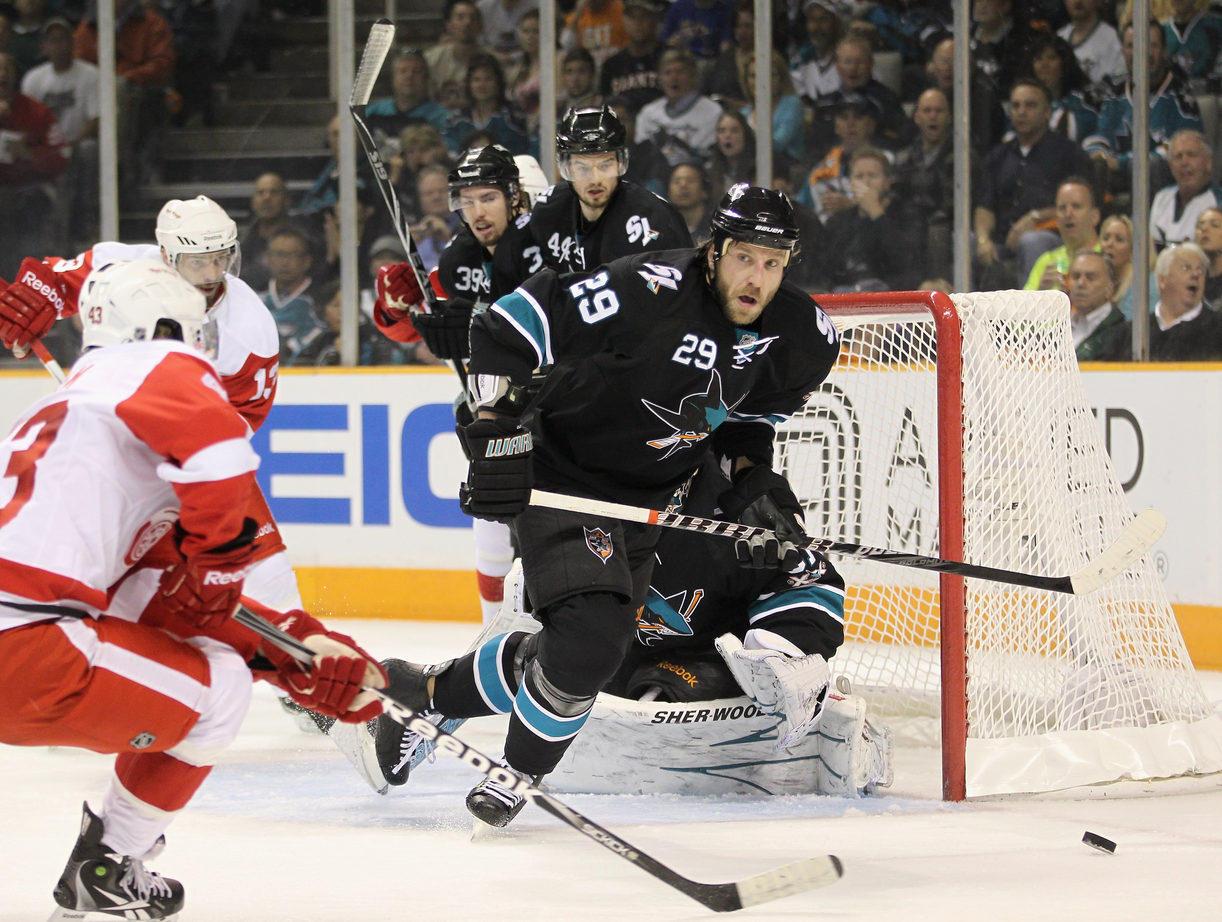 SAN JOSE, CA - MAY 12:  Ryane Clowe #29 of the San Jose Sharks goes for the puck during their game against the Detroit Red Wings in Game Seven of the Western Conference Semifinals during the 2011 NHL Stanley Cup Playoffs at HP Pavilion on May 12, 2011 in