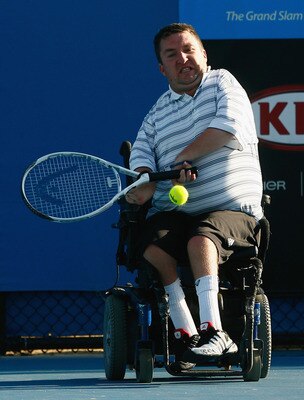 MELBOURNE, AUSTRALIA - JANUARY 30:  Nick Taylor of the United States of America plays a backhand in his Quad Wheelchair match against Peter Norfolk of Great Britain during day twelve of the 2009 Australian Open at Melbourne Park on January 30, 2009 in Mel