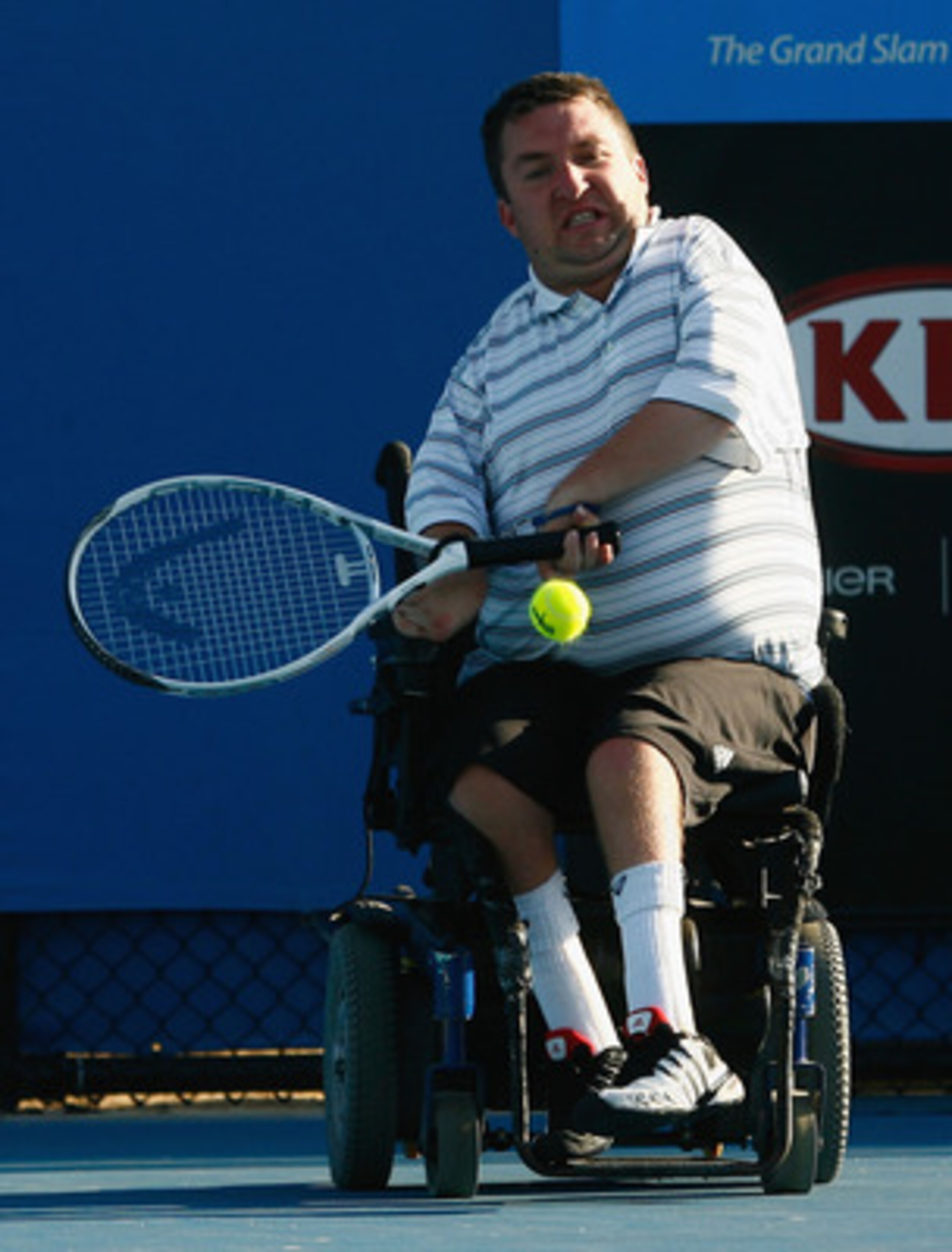 MELBOURNE, AUSTRALIA - JANUARY 30:  Nick Taylor of the United States of America plays a backhand in his Quad Wheelchair match against Peter Norfolk of Great Britain during day twelve of the 2009 Australian Open at Melbourne Park on January 30, 2009 in Mel