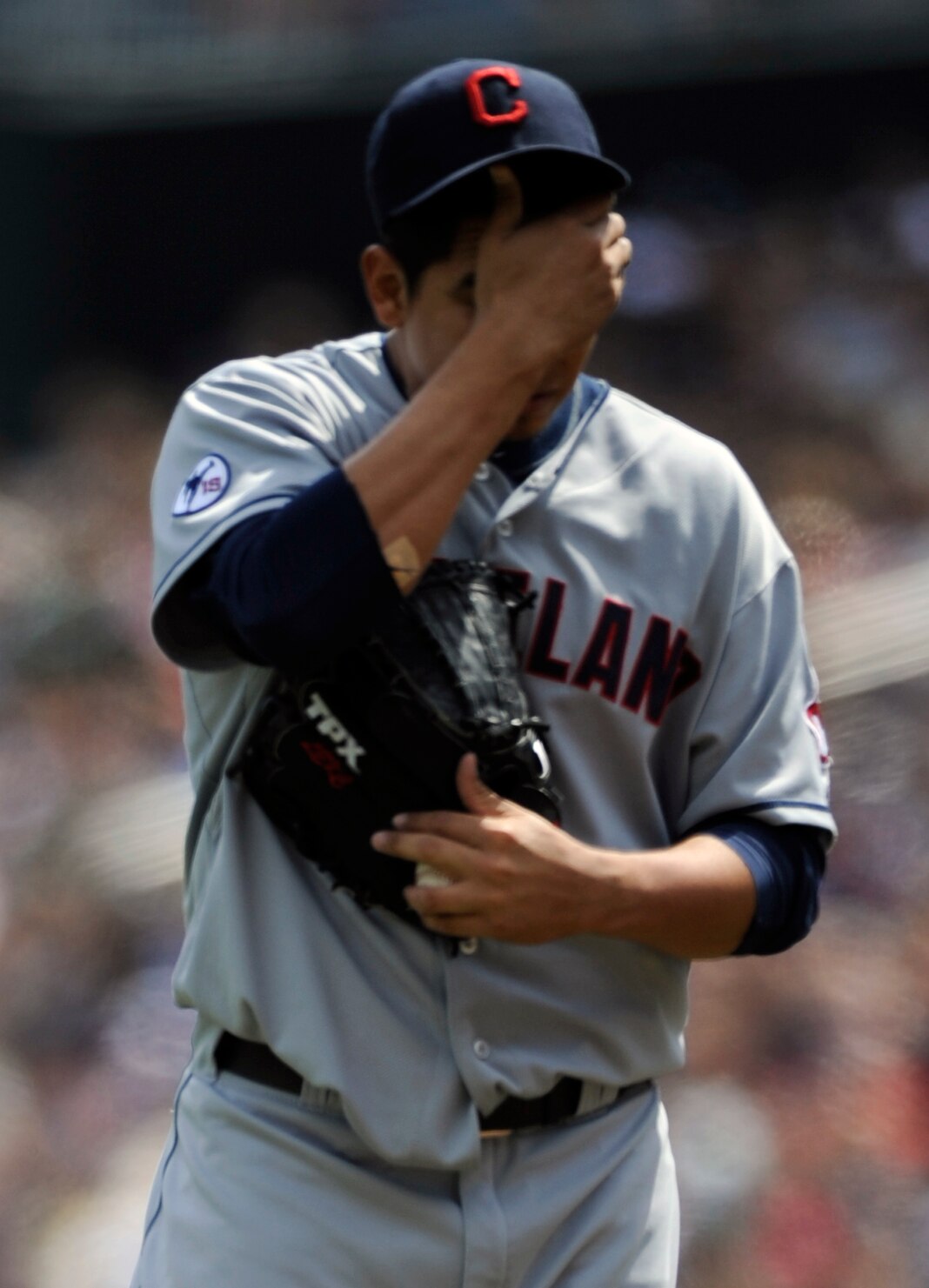 MINNEAPOLIS, MN - APRIL 24: Carlos Carrasco #59 of the Cleveland Indians reacts to walking Justin Morneau #33 of the Minnesota Twins during the first inning of their game on April 24, 2011 at Target Field in Minneapolis, Minnesota. (Photo by Hannah Foslie