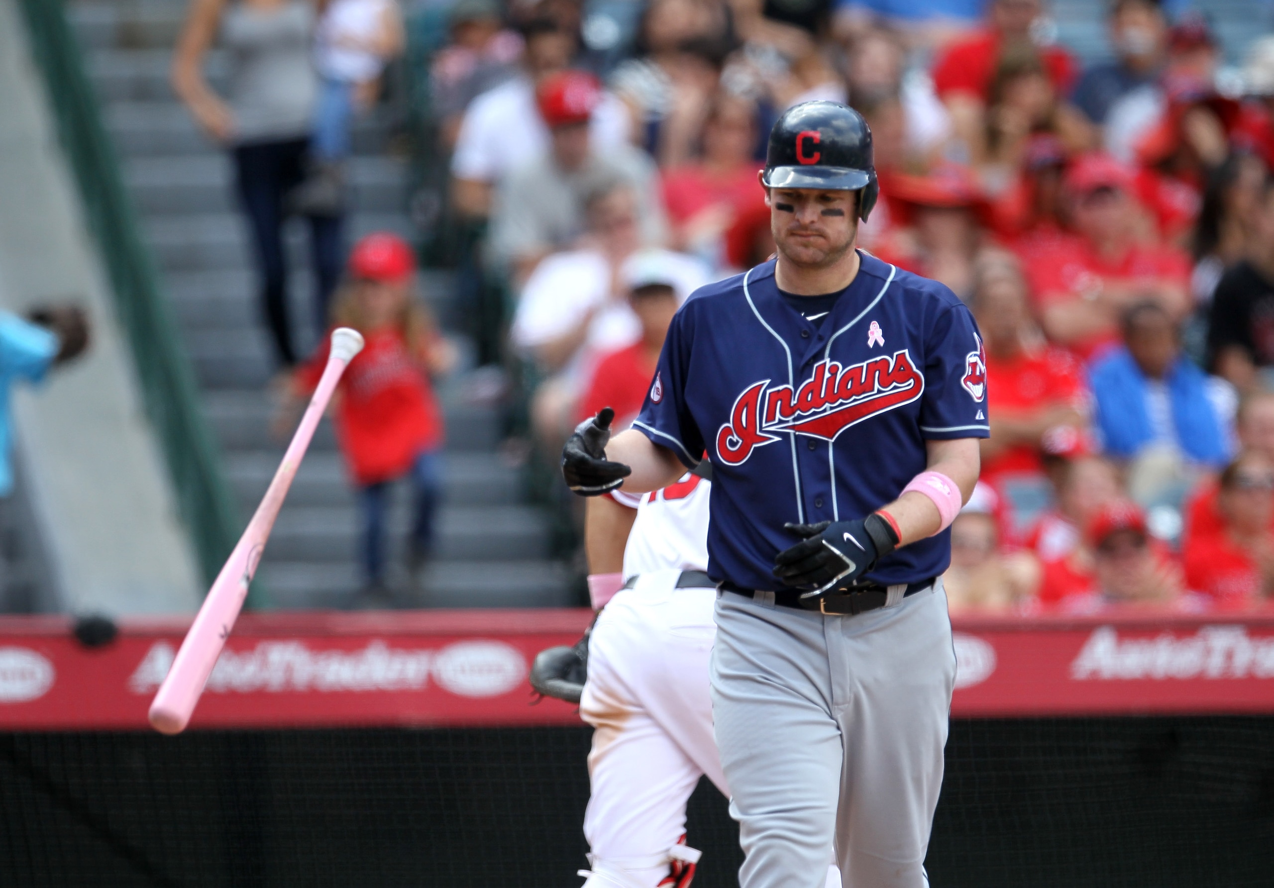 ANAHEIM, CA - MAY 8:  Austin Kearns #26 of the Cleveland Indians tosses his pink bat after striking out to end the eigth inning against the Los Angeles Angels of Anaheim on May 8, 2011 at Angel Stadium in Anaheim, California. Many players used pink bats t
