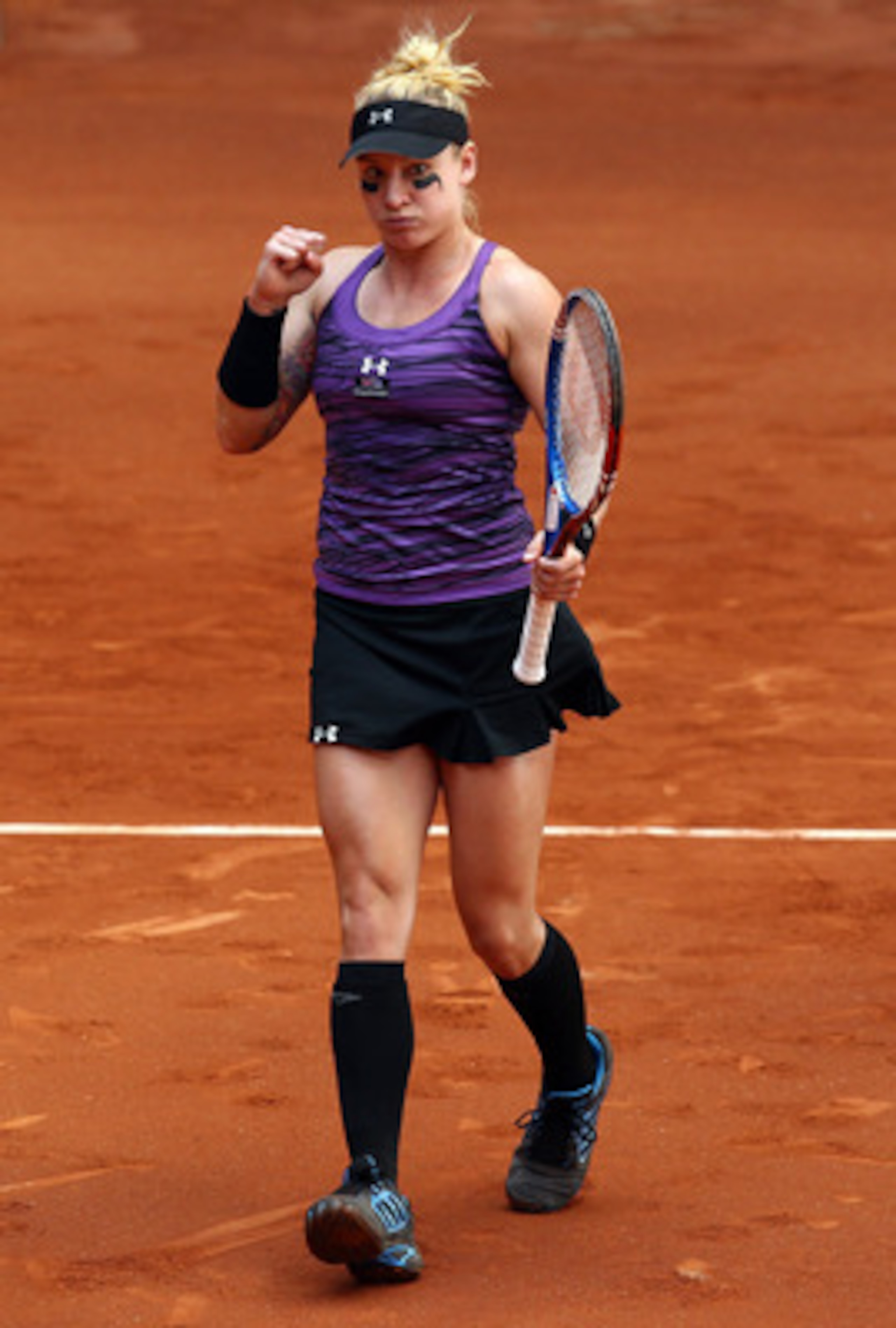 MADRID, SPAIN - MAY 05:  Bethanie Mattek-Sands of USA celebrates winning a game against Francesca Schiavone of Italy during day six of the Mutua Madrilena Madrid Open Tennis on May 5, 2011 in Madrid, Spain.  (Photo by Julian Finney/Getty Images)