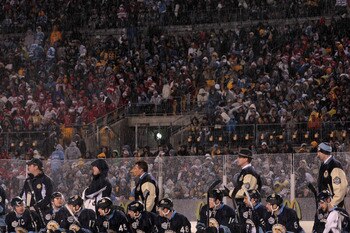 PITTSBURGH, PA - JANUARY 01:  The Pittsburgh Penguins are seen on their bench during the 2011 NHL Bridgestone Winter Classic against the Washington Capitals at Heinz Field on January 1, 2011 in Pittsburgh, Pennsylvania. Washington won 3-1.  (Photo by Jami