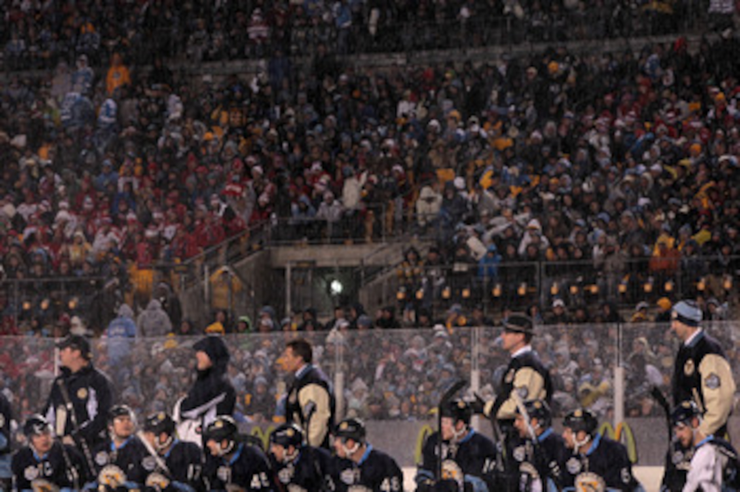 PITTSBURGH, PA - JANUARY 01:  The Pittsburgh Penguins are seen on their bench during the 2011 NHL Bridgestone Winter Classic against the Washington Capitals at Heinz Field on January 1, 2011 in Pittsburgh, Pennsylvania. Washington won 3-1.  (Photo by Jami