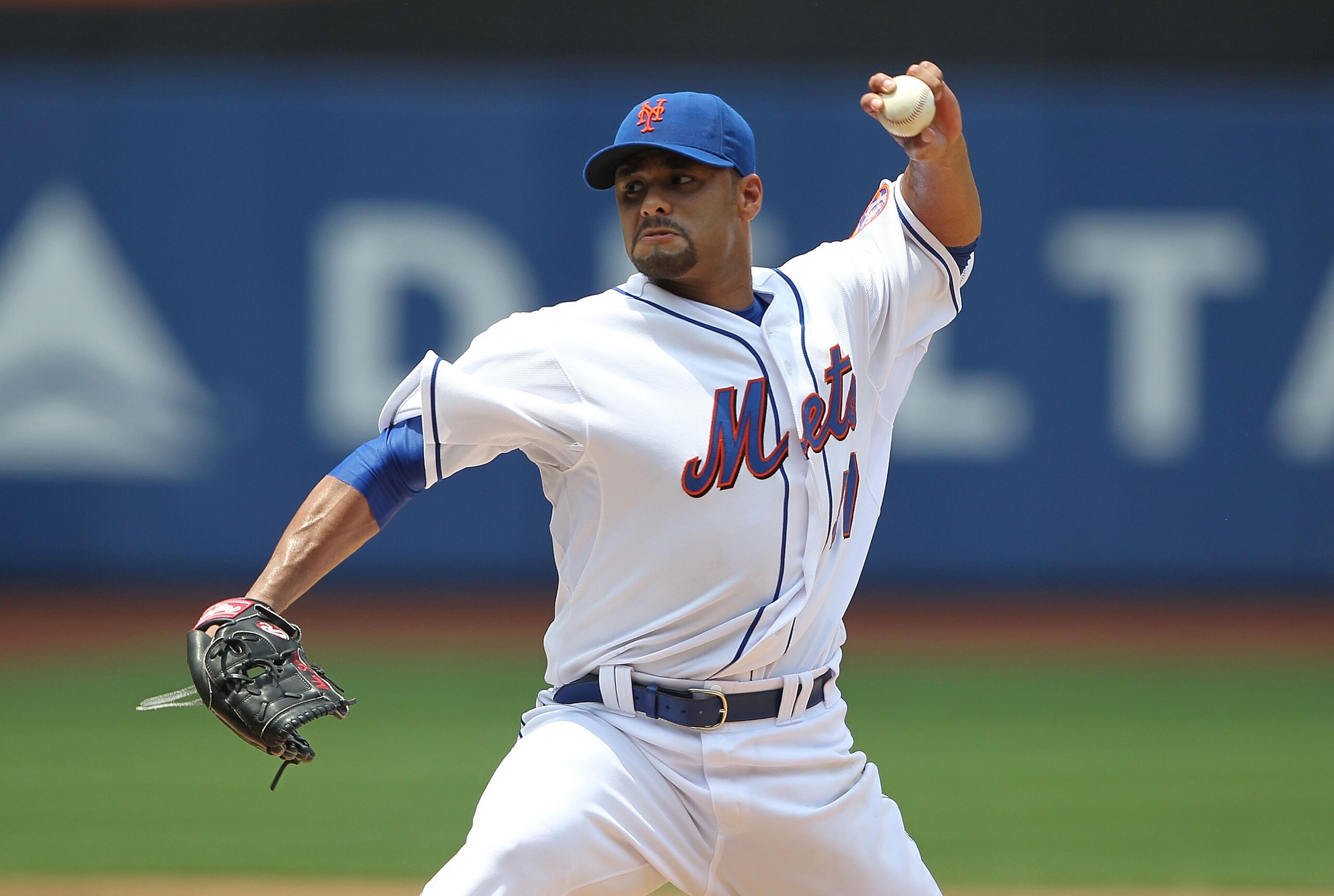 NEW YORK - JUNE 26:  Johan Santana #57 of the New York Mets pitches against the Minnesota Twins at Citi Field on June 26, 2010 in the Flushing neighborhood of the Queens borough of New York City.  (Photo by Nick Laham/Getty Images)