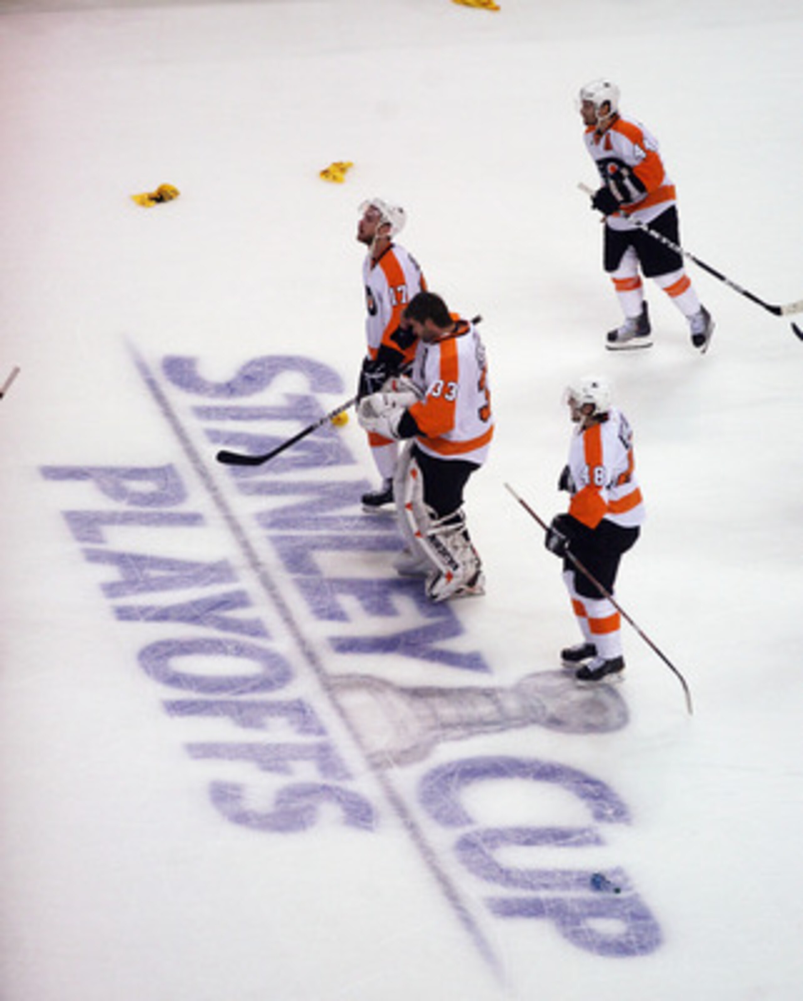 BOSTON, MA - MAY 06:Jeff Carter #17, Brian Boucher #33, Danny Briere #48 and Kimmo Timonen #44 of the Philadelphia Flyers leave the ice following defeat at the hands of the Boston Bruins in Game Four of the Eastern Conference Semifinals during the 2011 NH