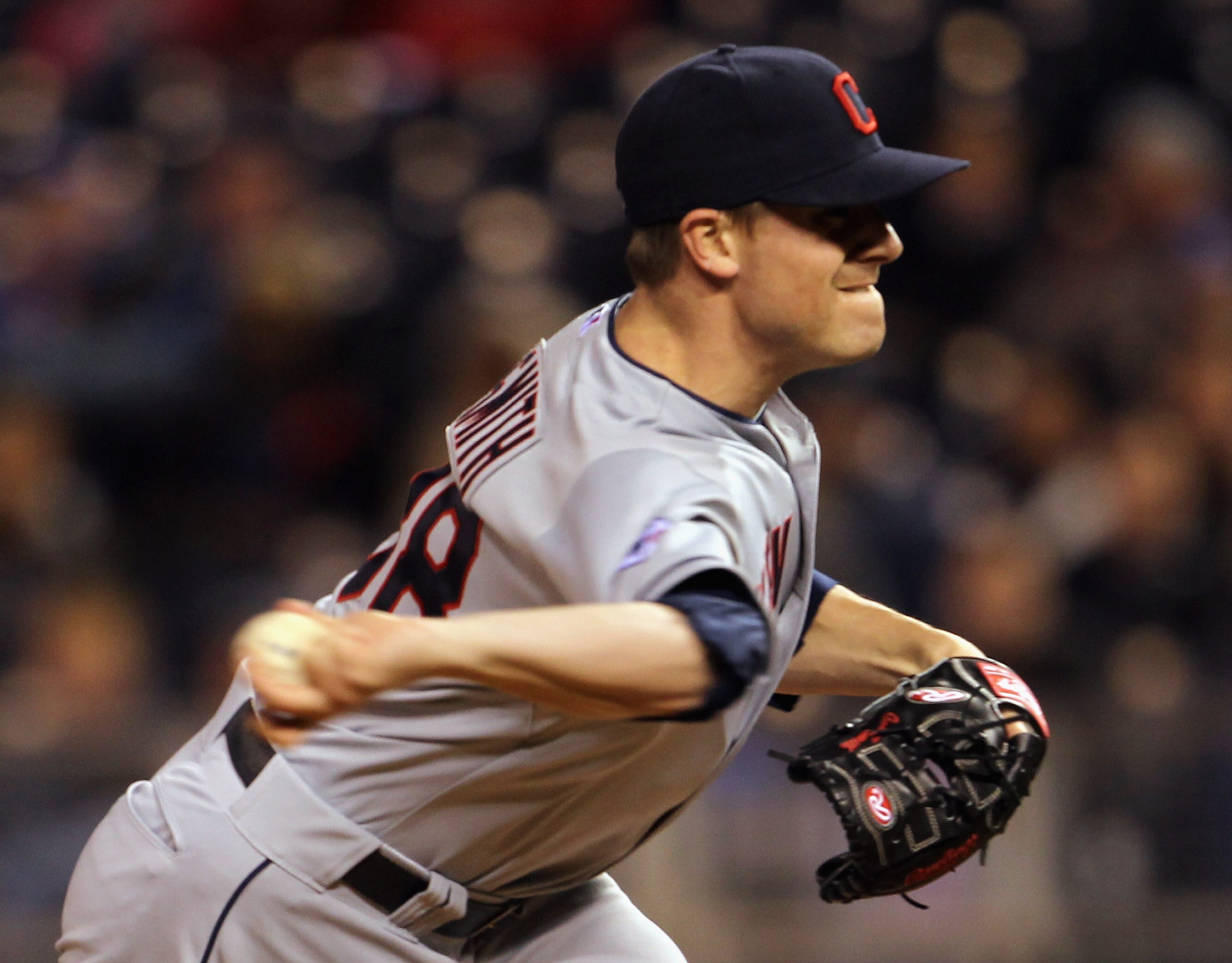 KANSAS CITY, MO - APRIL 20:  Pitcher Joe Smith #38 of the Cleveland Indians in action during the game against the Kansas City Royals on April 20, 2011 at Kauffman Stadium in Kansas City, Missouri.  (Photo by Jamie Squire/Getty Images)