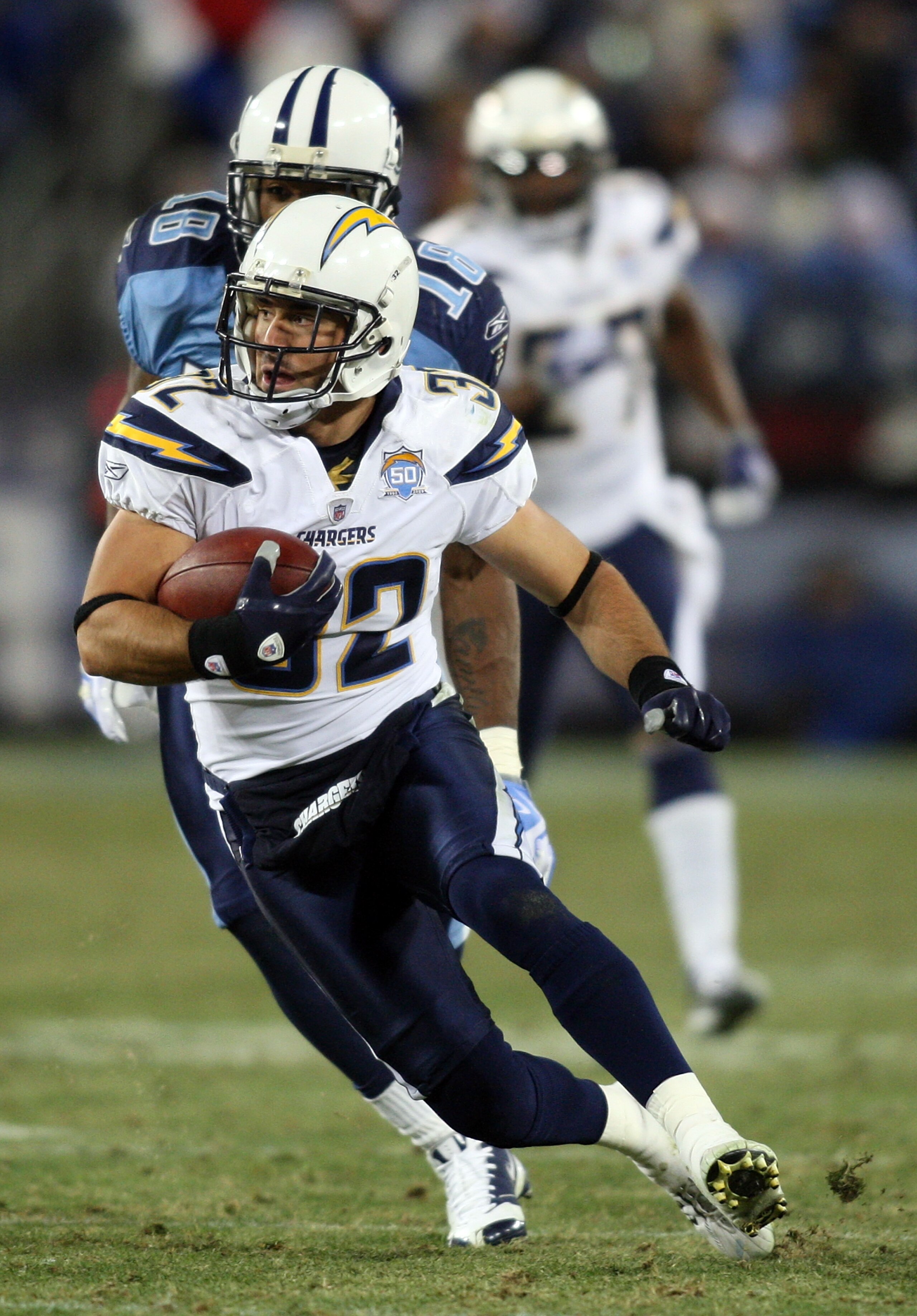 NASHVILLE, TN - DECEMBER 25: Eric Weddle #32 of the San Diego Chargers returns this interception intended for Kenny Britt #18 of the Tennessee Titans on December 25, 2009 at LP Field in Nashville, Tennessee. (Photo by Rex Brown/Getty Images) NASHVILLE, TN - DECEMBER 25: Eric Weddle #32 of the San Diego Chargers returns this interception intended for Kenny Britt #18 of the Tennessee Titans on December 25, 2009 at LP Field in Nashville, Tennessee. (Photo by Rex Brown/Getty Images)