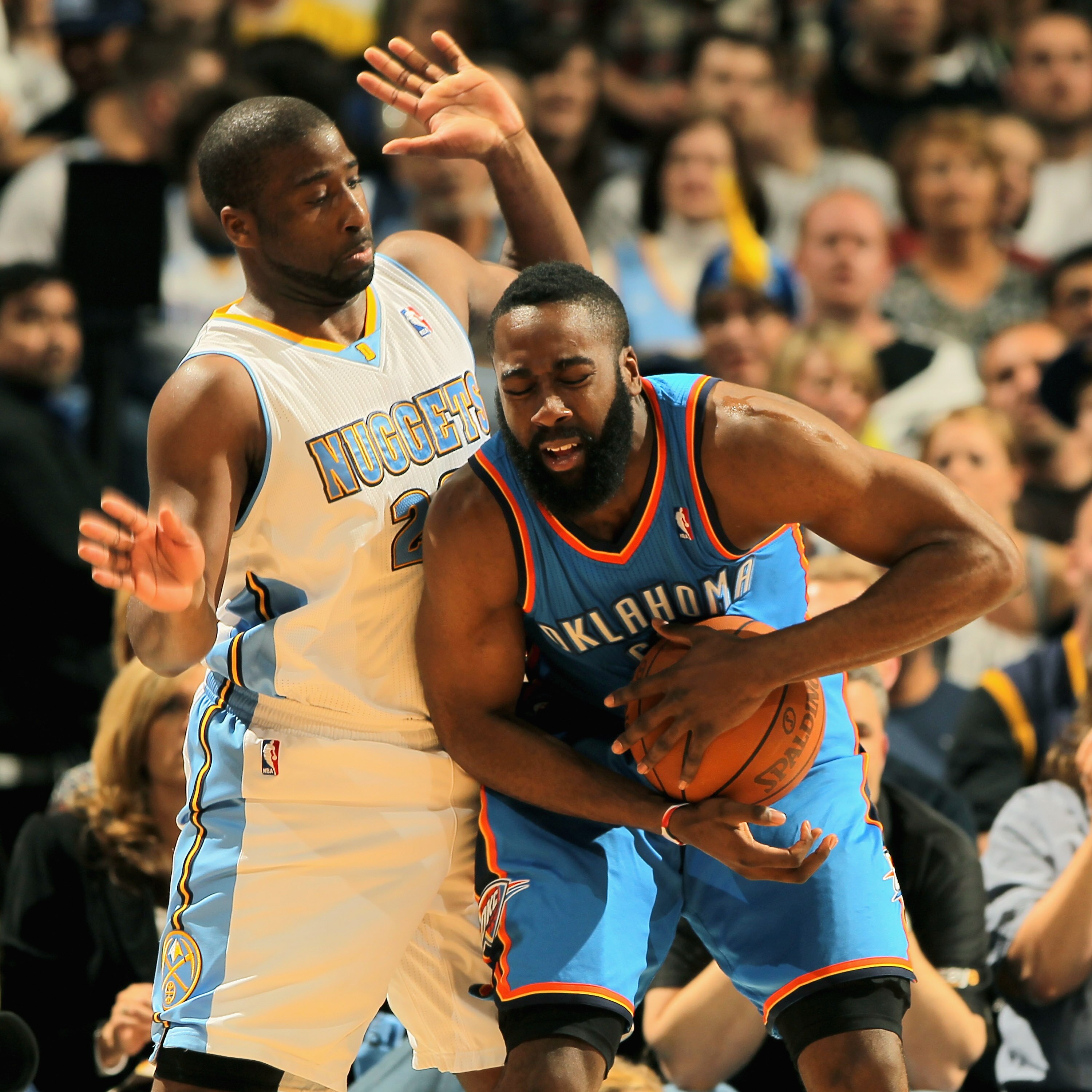 DENVER, CO - APRIL 25:  James Harden #13 of the Oklahoma City Thunder is fouled by Raymond Felton #20 of the Denver Nuggets in Game Four of the Western Conference Quarterfinals in the 2011 NBA Playoffs on April 24, 2011 at the Pepsi Center in Denver, Colo