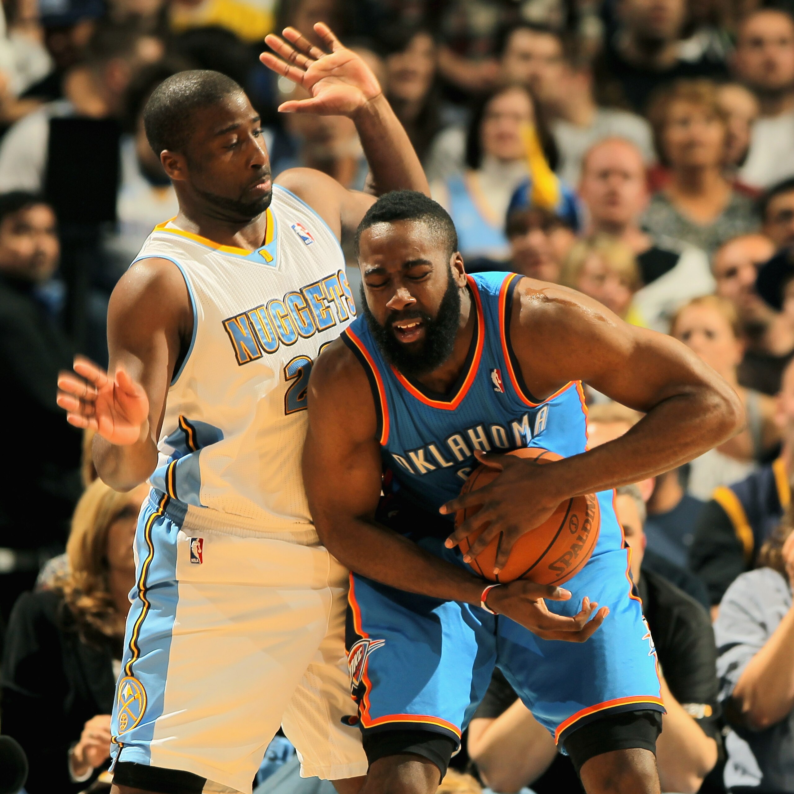 DENVER, CO - APRIL 25:  James Harden #13 of the Oklahoma City Thunder is fouled by Raymond Felton #20 of the Denver Nuggets in Game Four of the Western Conference Quarterfinals in the 2011 NBA Playoffs on April 24, 2011 at the Pepsi Center in Denver, Colo