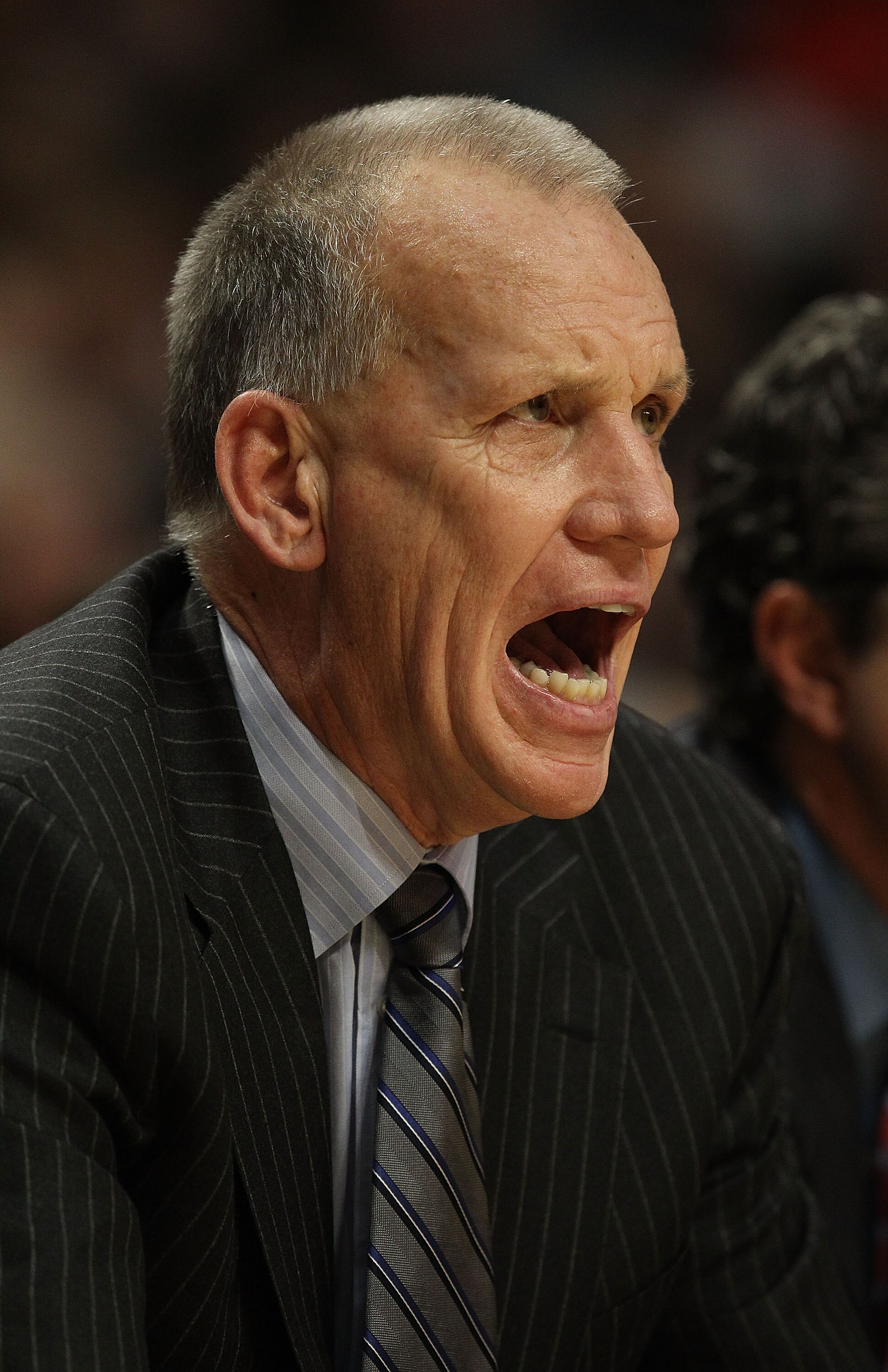 CHICAGO, IL - DECEMBER 21: Head coach Doug Collins of the Philadelphia 76ers gives instructions to his team against the Chicago Bulls at the United Center on December 21, 2010 in Chicago, Illinois. The Bulls defeated the 76ers 121-76. NOTE TO USER: User e
