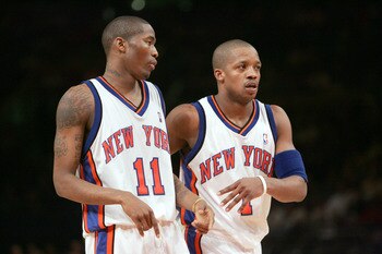 NEW YORK - APRIL 7:  Steve Francis #1 of the New York Knicks talks with his teammate Jamal Crawford #11 during the game against the Indiana Pacers on April 7, 2006 at Madison Square Garden in New York City, New York.  The Knicks won 98-96.  (Photo by Nick