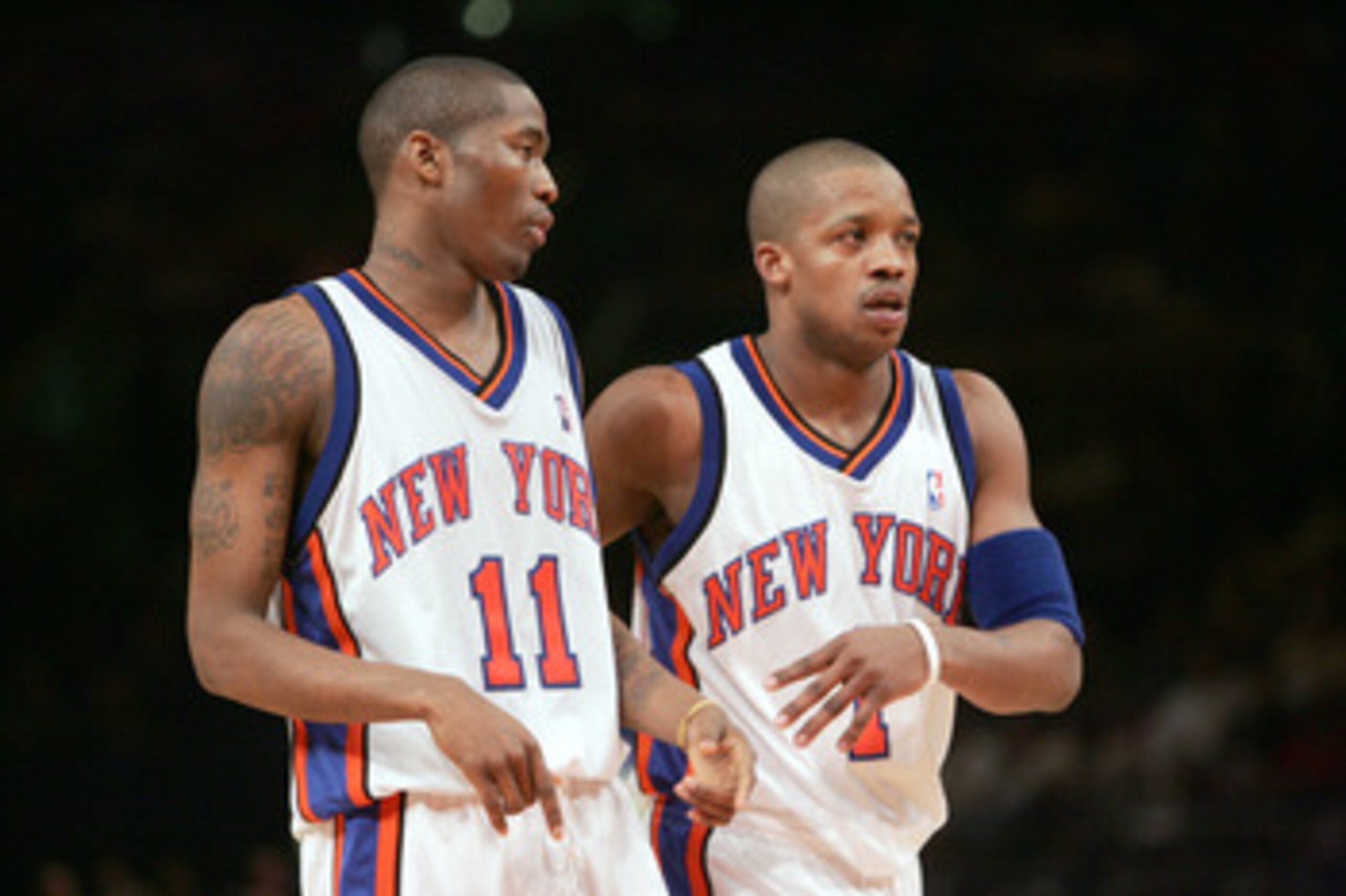 NEW YORK - APRIL 7:  Steve Francis #1 of the New York Knicks talks with his teammate Jamal Crawford #11 during the game against the Indiana Pacers on April 7, 2006 at Madison Square Garden in New York City, New York.  The Knicks won 98-96.  (Photo by Nick