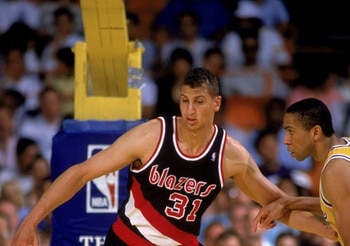 INGLEWOOD, CA - 1989:  Sam Bowie #31 of the Portland Trail Blazers battles for position during a game in the 1988-89 NBA season against the Los Angeles Lakers at the Great Western Forum in Inglewood, California.  (Photo by Stephen Dunn/Getty Images)