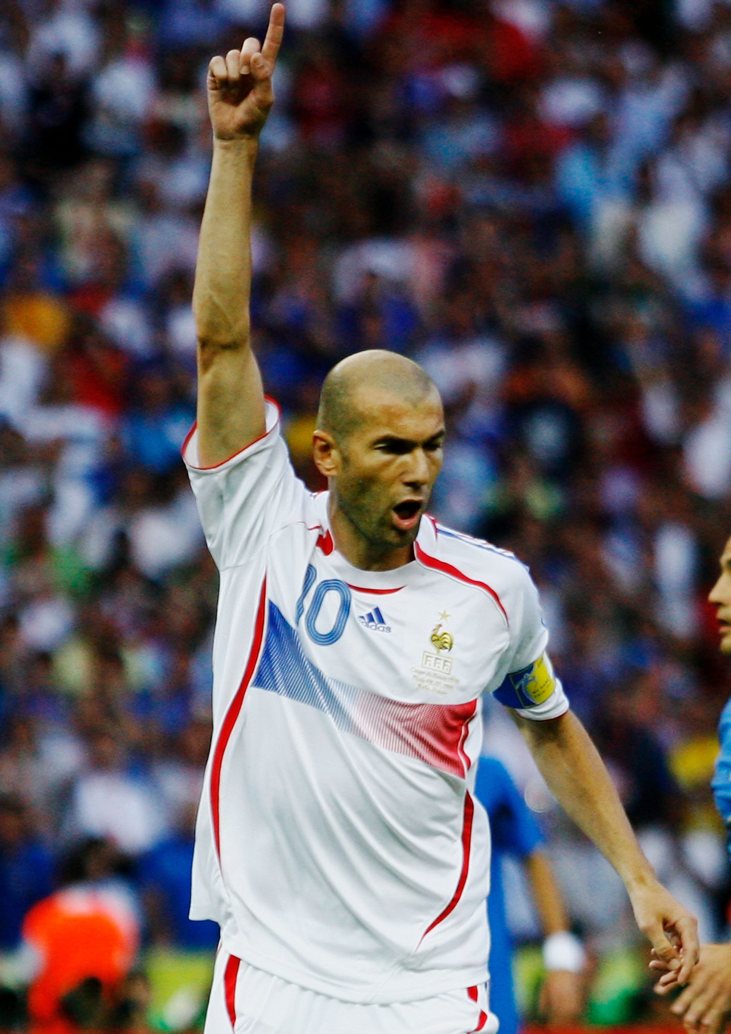 BERLIN - JULY 09:  Zinedine Zidane of France celebrates scoring the opening goal  from the penalty spot during the FIFA World Cup Germany 2006 Final match between Italy and France at the Olympic Stadium on July 9, 2006 in Berlin, Germany.  (Photo by Shaun