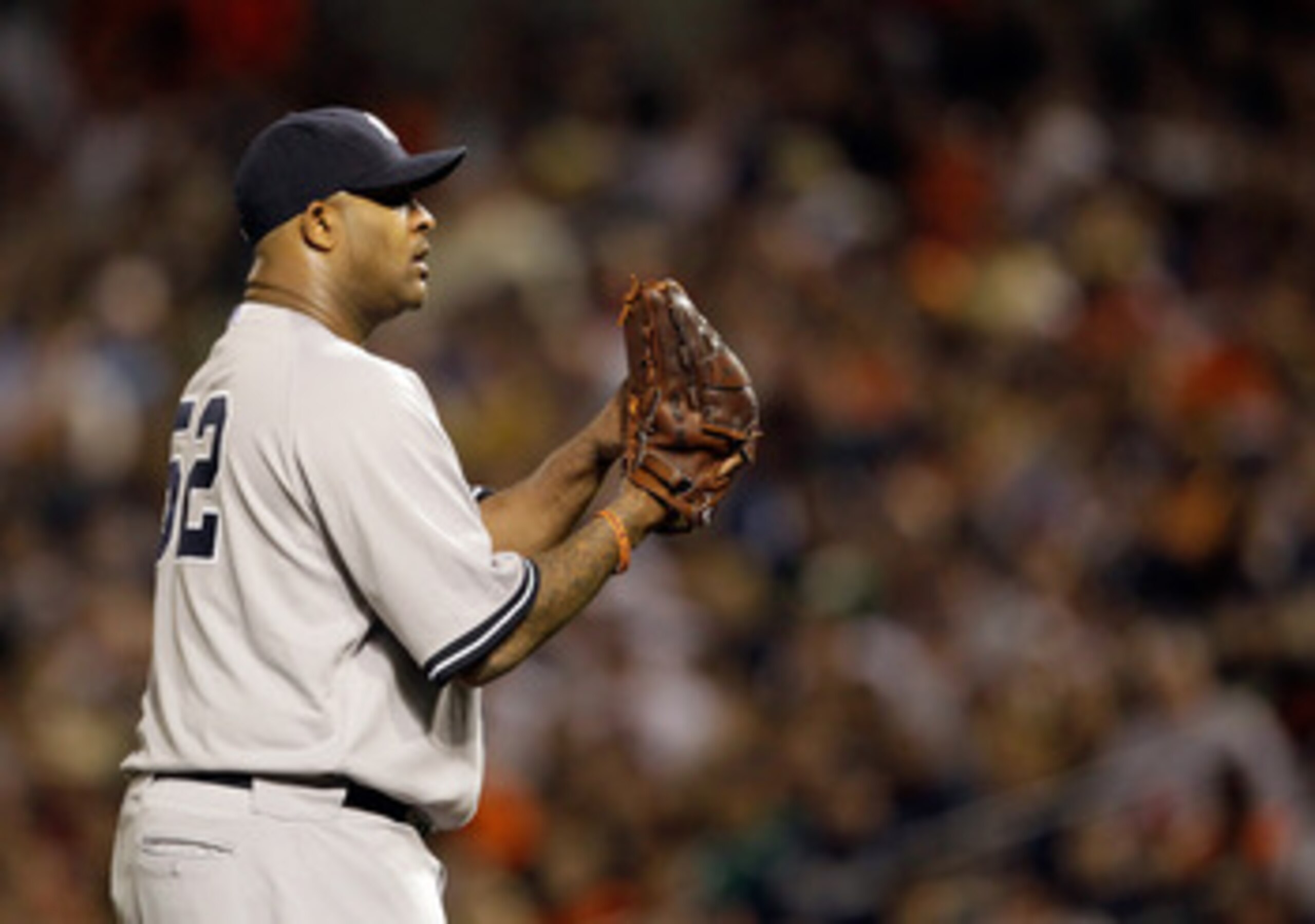 BALTIMORE, MD - APRIL 23:  Pitcher CC Sabathia #52 of the New York Yankees delivers to a Baltimore Orioles batter at Oriole Park at Camden Yards on April 23, 2011 in Baltimore, Maryland.  (Photo by Rob Carr/Getty Images)