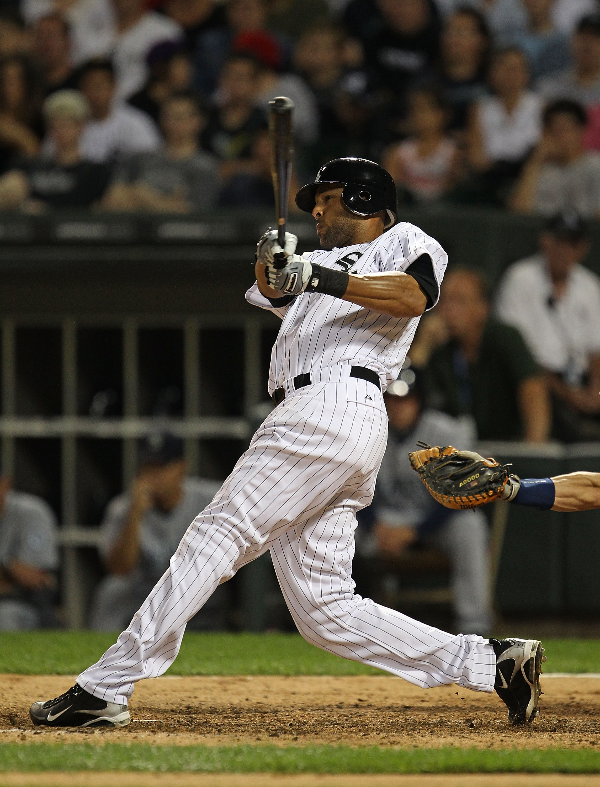 CHICAGO - JULY 26: Alex Rios #51 of the Chicago White Sox takes a swing against the Seattle Mariners at U.S. Cellular Field on July 26, 2010 in Chicago, Illinois. The White Sox defeated the Mariners 6-1.  (Photo by Jonathan Daniel/Getty Images)