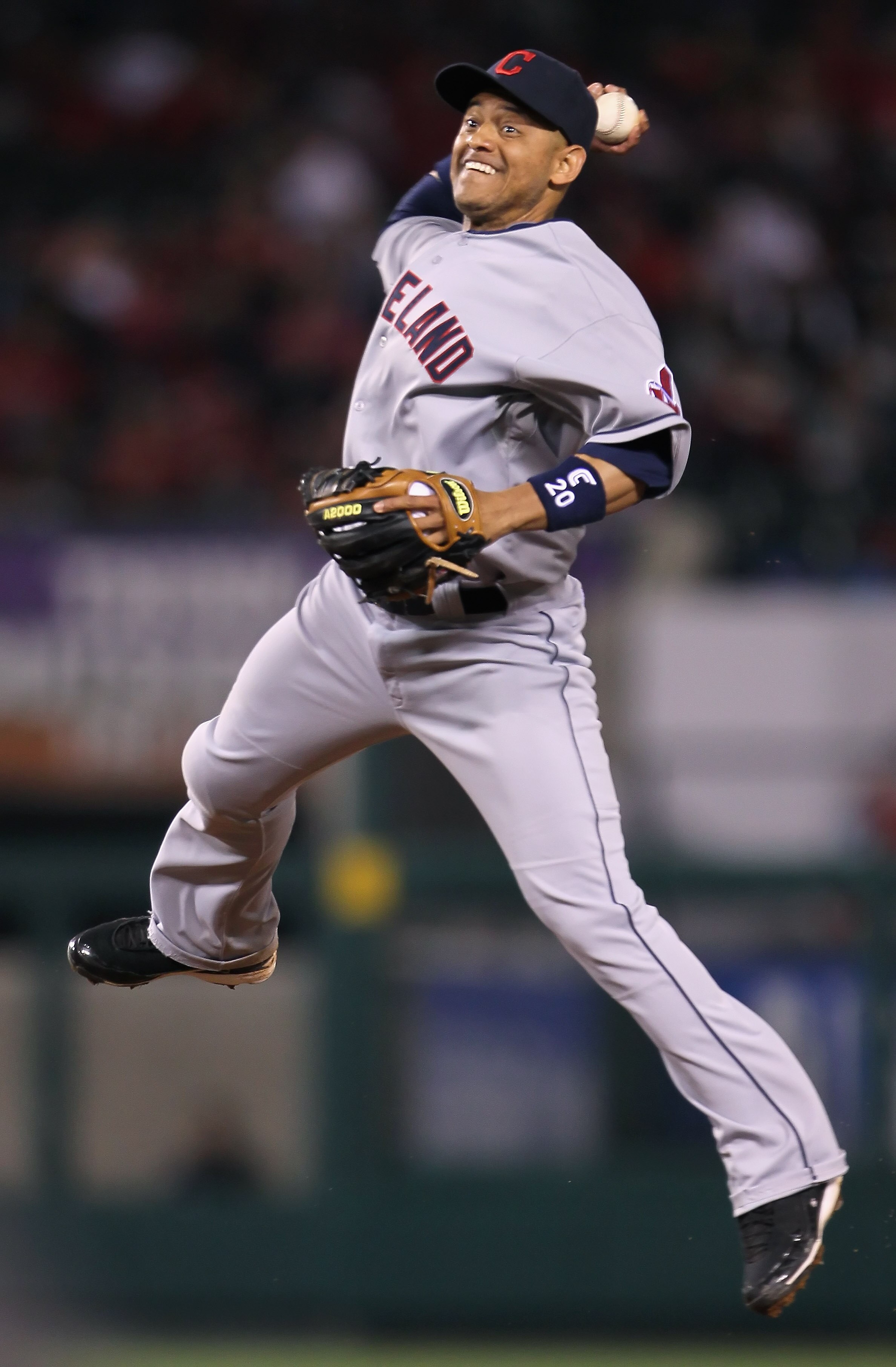 ANAHEIM, CA - MAY 06:  Second baseman Orlando Cabrera #20 of the Cleveland Indians throws Alexi Amarista (not pictured) of the Los Angeles Angels of Anaheim out at first base in the fifth inning at Angel Stadium of Anaheim on May 6, 2011 in Anaheim, Calif